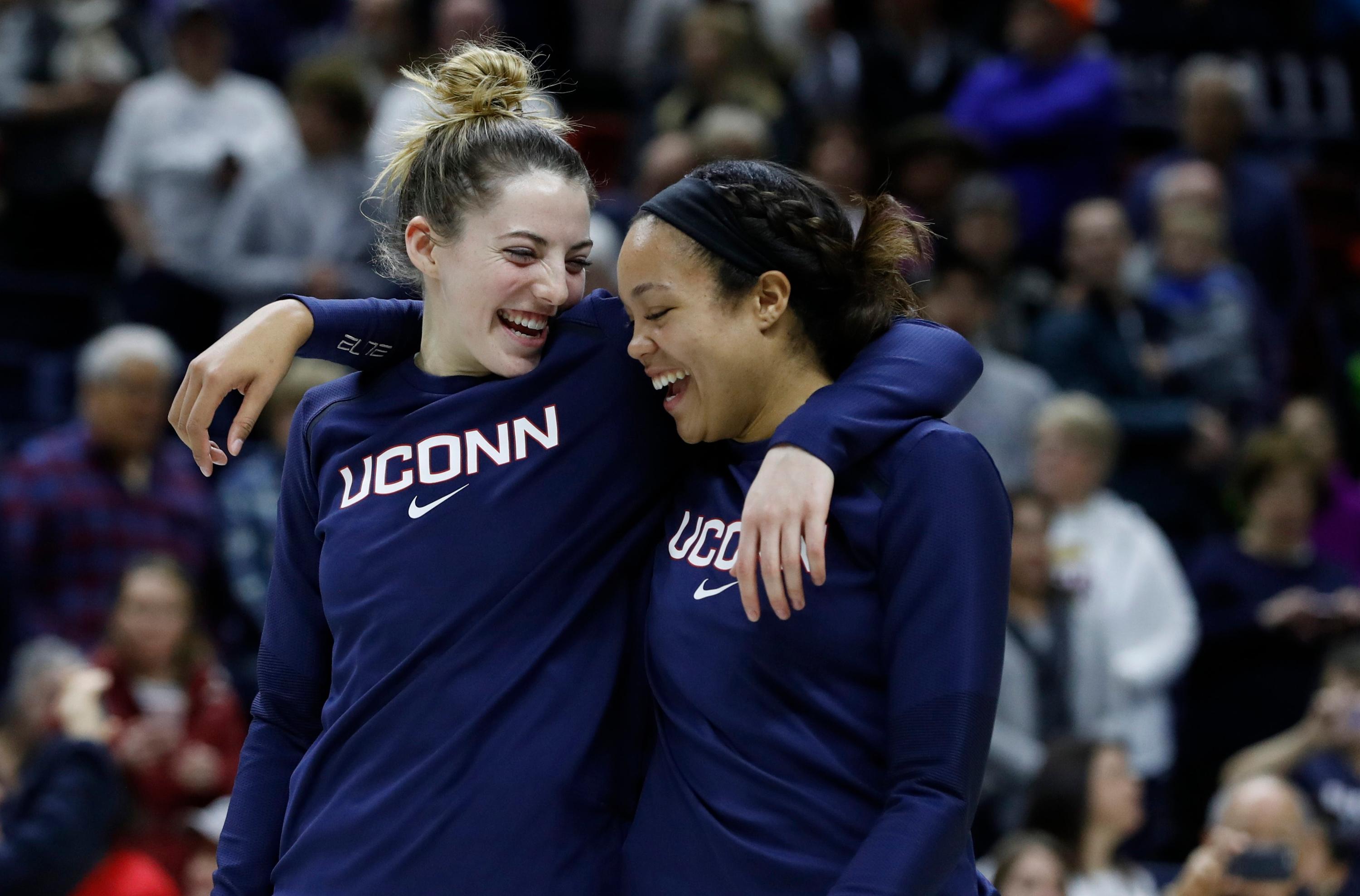 Mar 2, 2019; Storrs, CT, USA; UConn Huskies UConn Huskies guard Katie Lou Samuelson (33) and forward Napheesa Collier (24) walk onto the court as they are honored on Senior day before the start of the game against the Houston Cougars at Gampel Pavilion. Mandatory Credit: David Butler II-USA TODAY Sports 