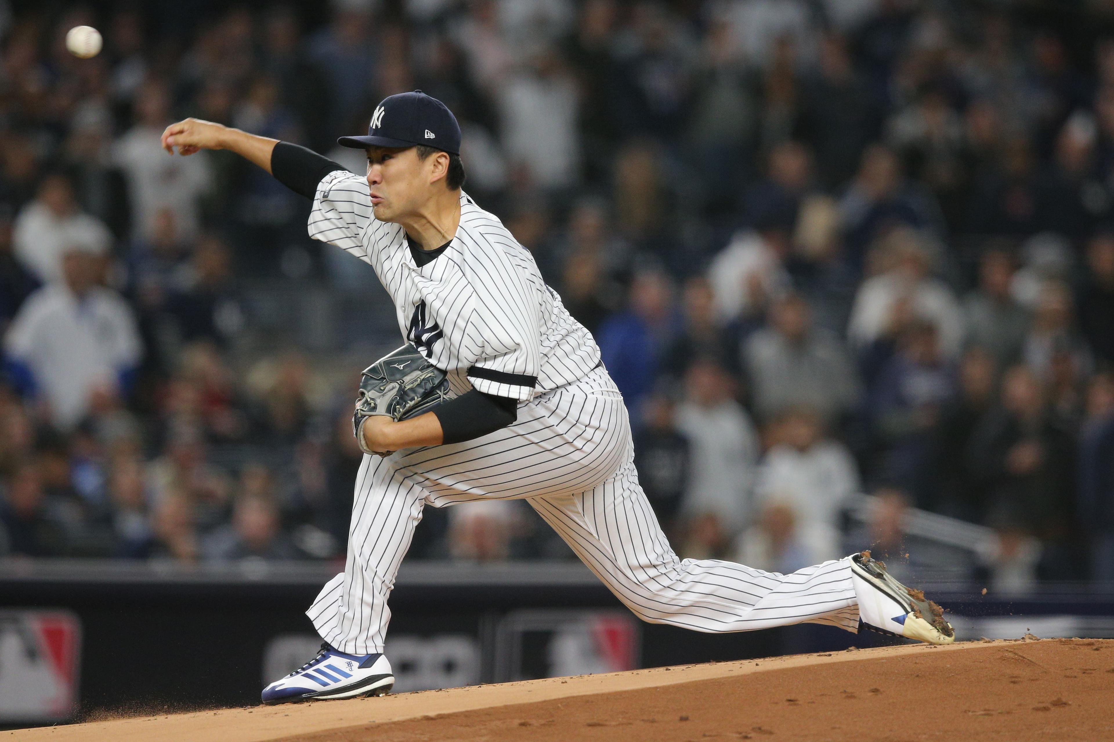 Oct 17, 2019; Bronx, NY, USA; New York Yankees starting pitcher Masahiro Tanaka (19) throws against the Houston Astros in game four of the 2019 ALCS playoff baseball series at Yankee Stadium. Mandatory Credit: Brad Penner-USA TODAY Sports / Brad Penner