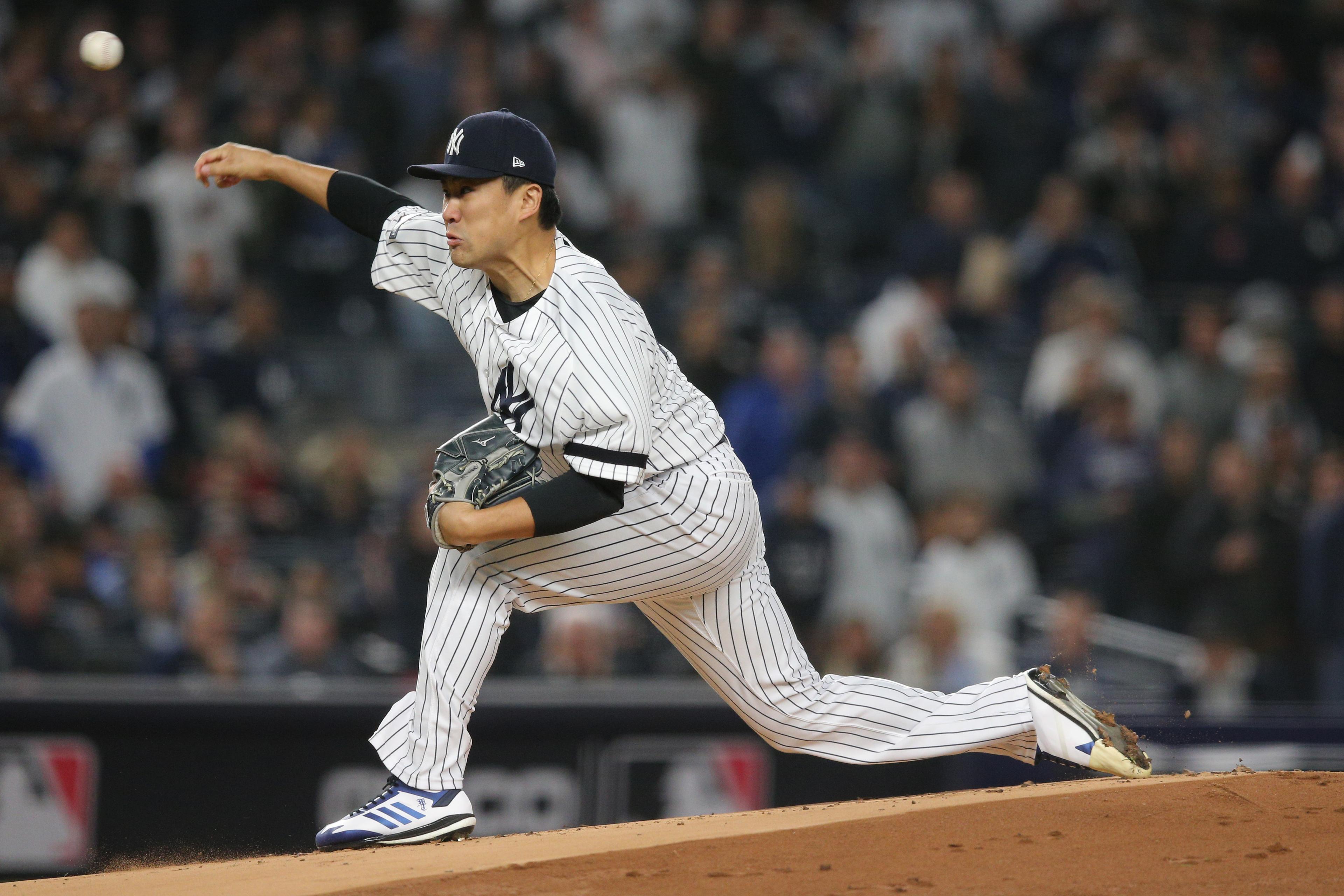 Oct 17, 2019; Bronx, NY, USA; New York Yankees starting pitcher Masahiro Tanaka (19) throws against the Houston Astros in game four of the 2019 ALCS playoff baseball series at Yankee Stadium. Mandatory Credit: Brad Penner-USA TODAY Sports