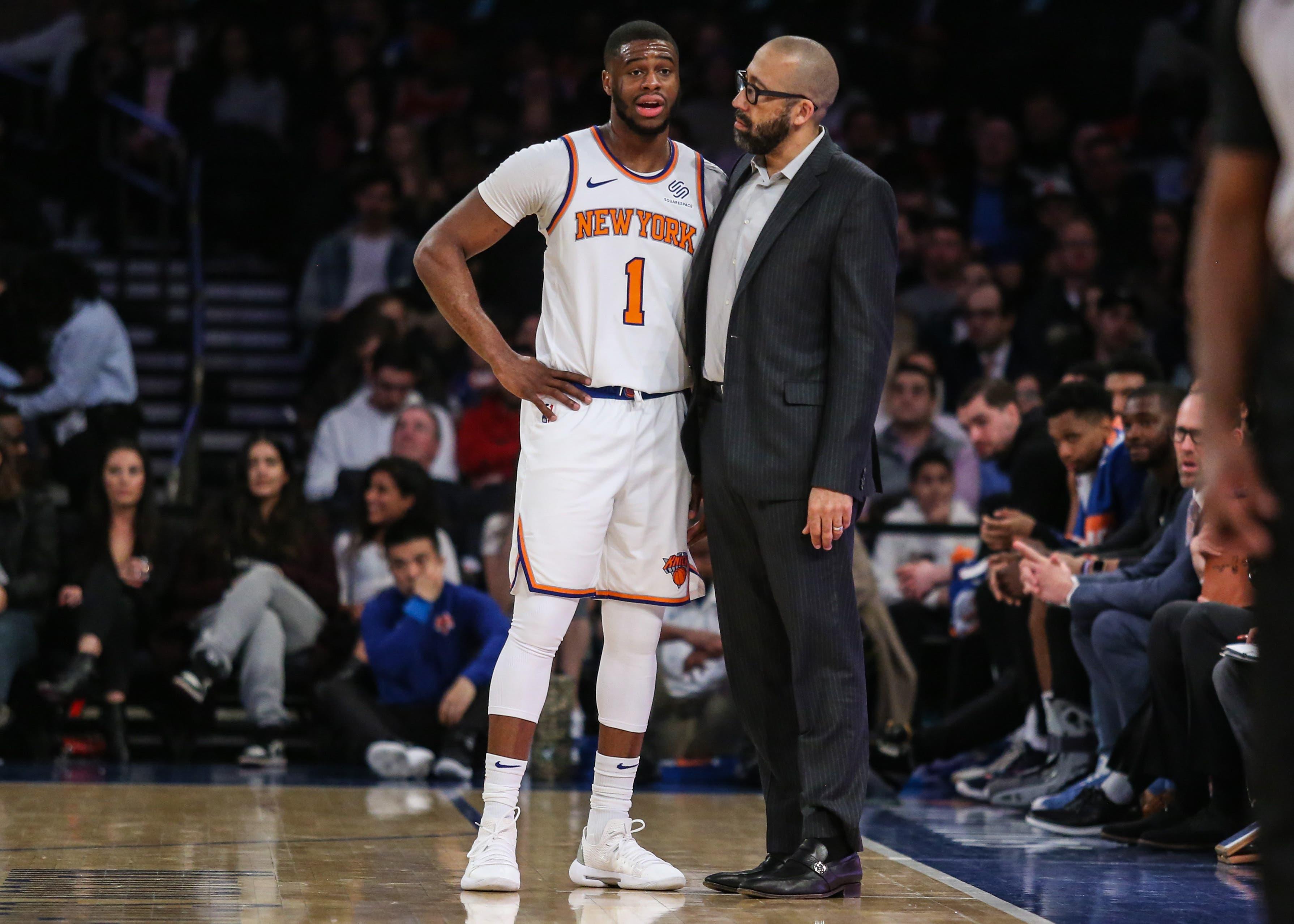 Apr 1, 2019; New York, NY, USA; New York Knicks head coach David Fizdale and guard Emmanuel Mudiay (1) at Madison Square Garden. Mandatory Credit: Wendell Cruz-USA TODAY Sports / Wendell Cruz