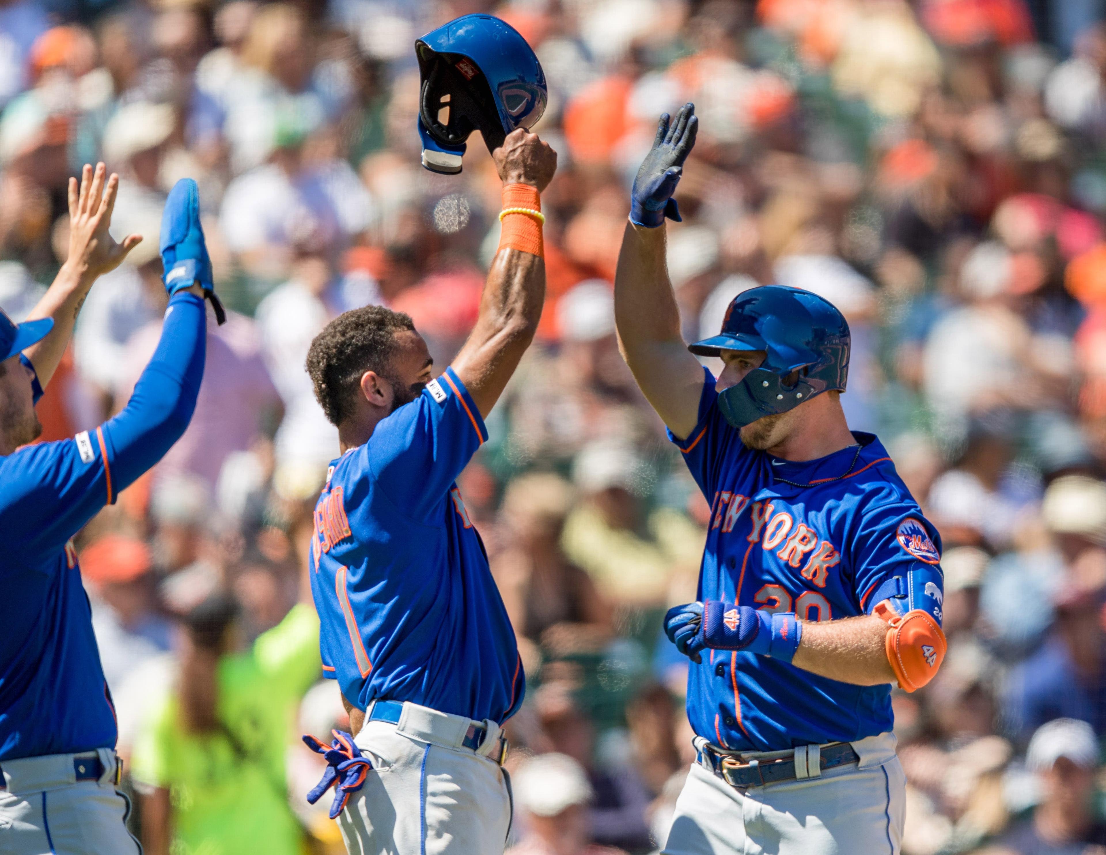 Jul 20, 2019; San Francisco, CA, USA; New York Mets first baseman Pete Alonso (20) celebrates with shortstop Amed Rosario (1) after hitting a three-run home run against the San Francisco Giants in the sixth inning at Oracle Park. Mandatory Credit: John Hefti-USA TODAY Sports / John Hefti