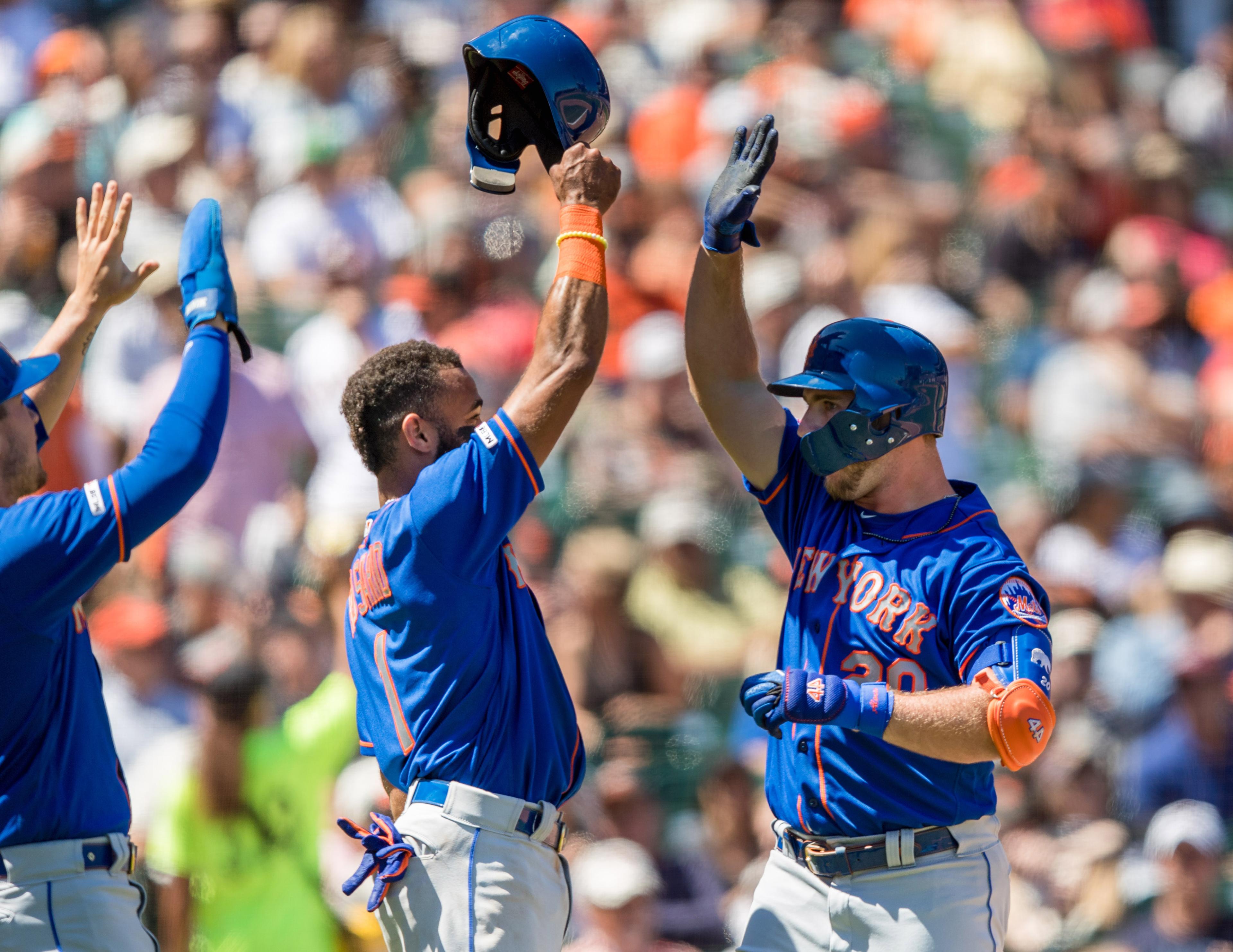 Jul 20, 2019; San Francisco, CA, USA; New York Mets first baseman Pete Alonso (20) celebrates with shortstop Amed Rosario (1) after hitting a three-run home run against the San Francisco Giants in the sixth inning at Oracle Park. Mandatory Credit: John Hefti-USA TODAY Sports