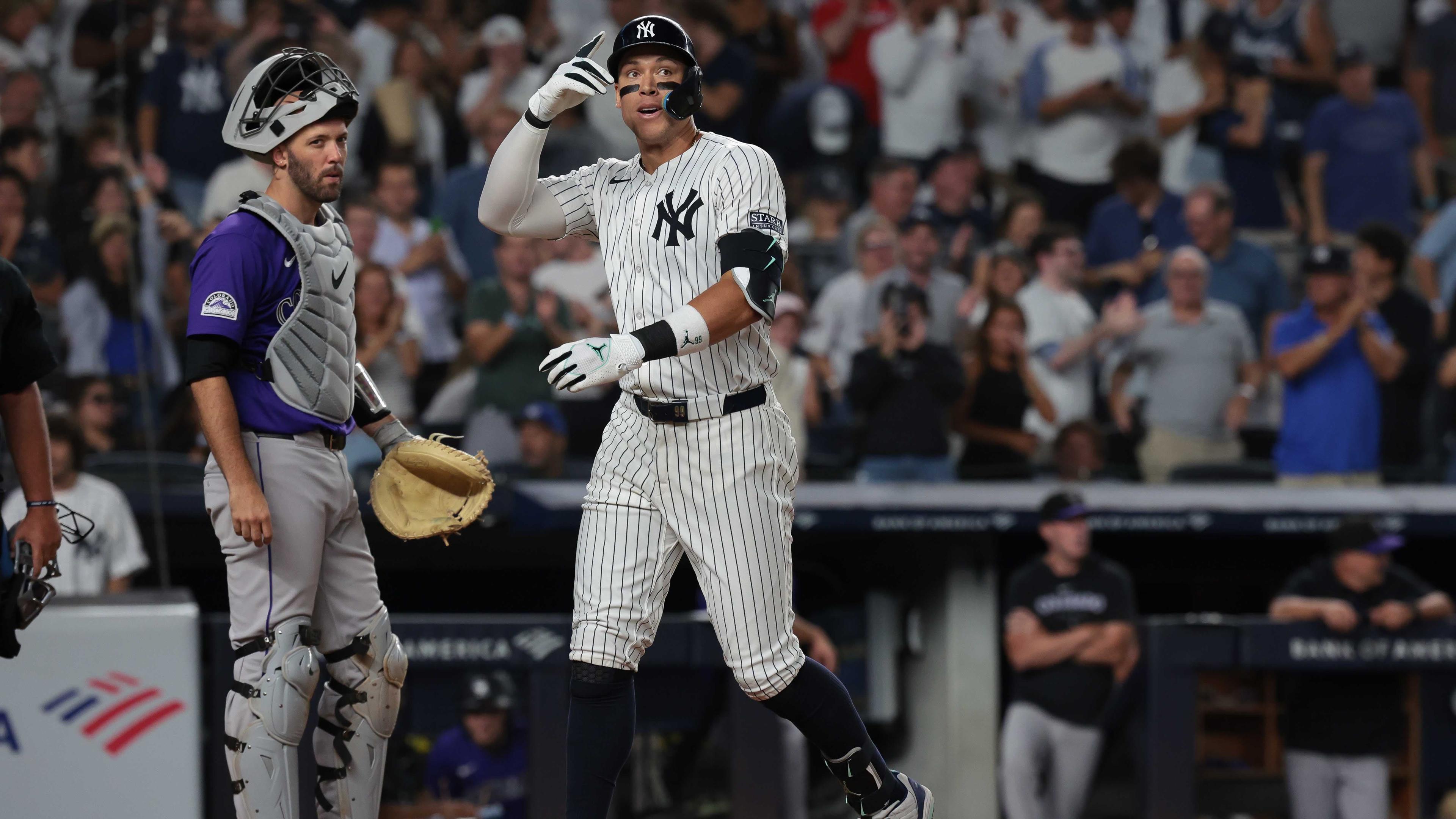 New York Yankees center fielder Aaron Judge (99) celebrates his solo home run during the sixth inning against the Colorado Rockies at Yankee Stadium. / Vincent Carchietta-USA TODAY Sports