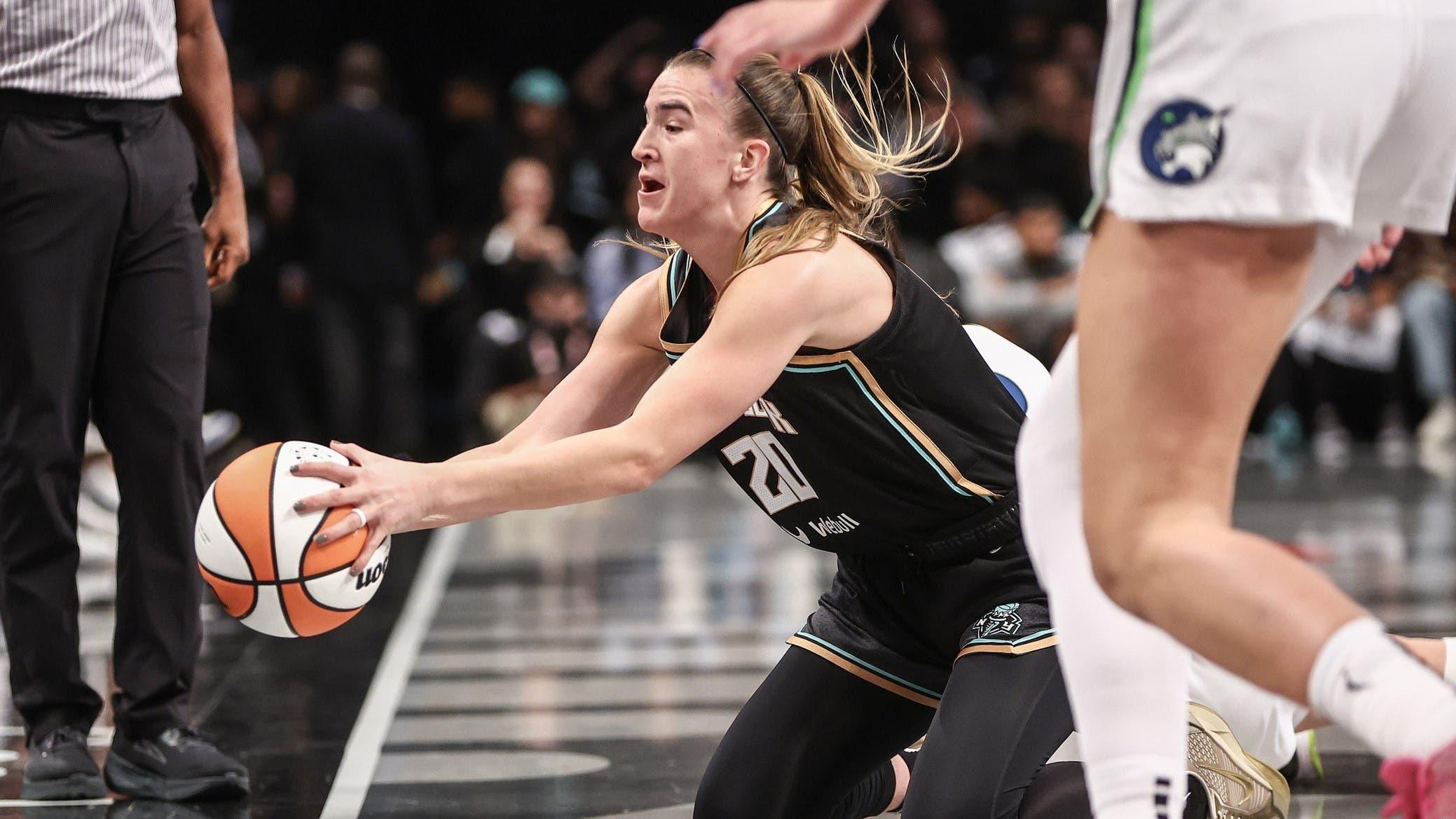 Oct 10, 2024; Brooklyn, New York, USA; New York Liberty guard Sabrina Ionescu (20) saves the ball from going out of bounds in the first quarter against the Minnesota Lynx at Barclays Center. / Wendell Cruz-Imagn Images