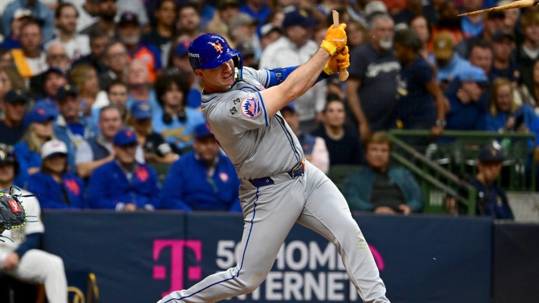 Oct 2, 2024; Milwaukee, Wisconsin, USA; New York Mets first baseman Pete Alonso (20) hits a broken bat single during the seventh inning in game two of the Wildcard round for the 2024 MLB Playoffs against the Milwaukee Brewers at American Family Field. / Benny Sieu-Imagn Images