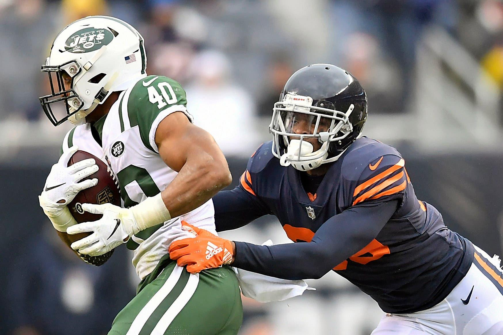 Oct 28, 2018; Chicago, IL, USA; Chicago Bears free safety Eddie Jackson (39) tackles New York Jets running back Trenton Cannon (40) at Soldier Field. Mandatory Credit: Quinn Harris-USA TODAY Sports / Quinn Harris