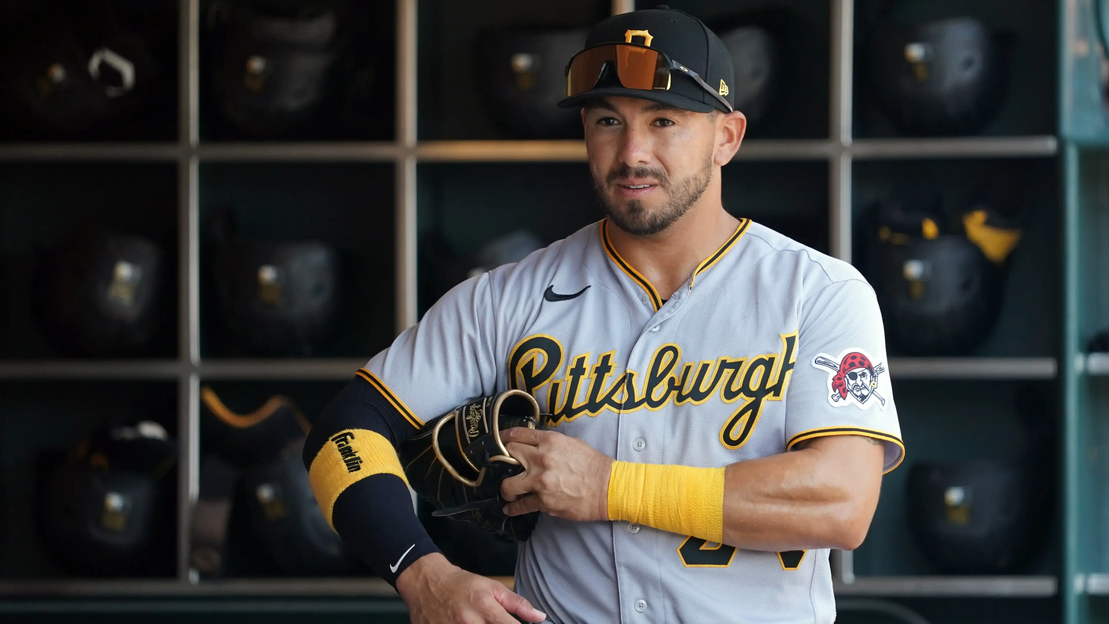 Pittsburgh Pirates left fielder Phillip Evans (24) walks in the dugout before the game against the San Francisco Giants at Oracle Park. / Darren Yamashita-USA TODAY Sports