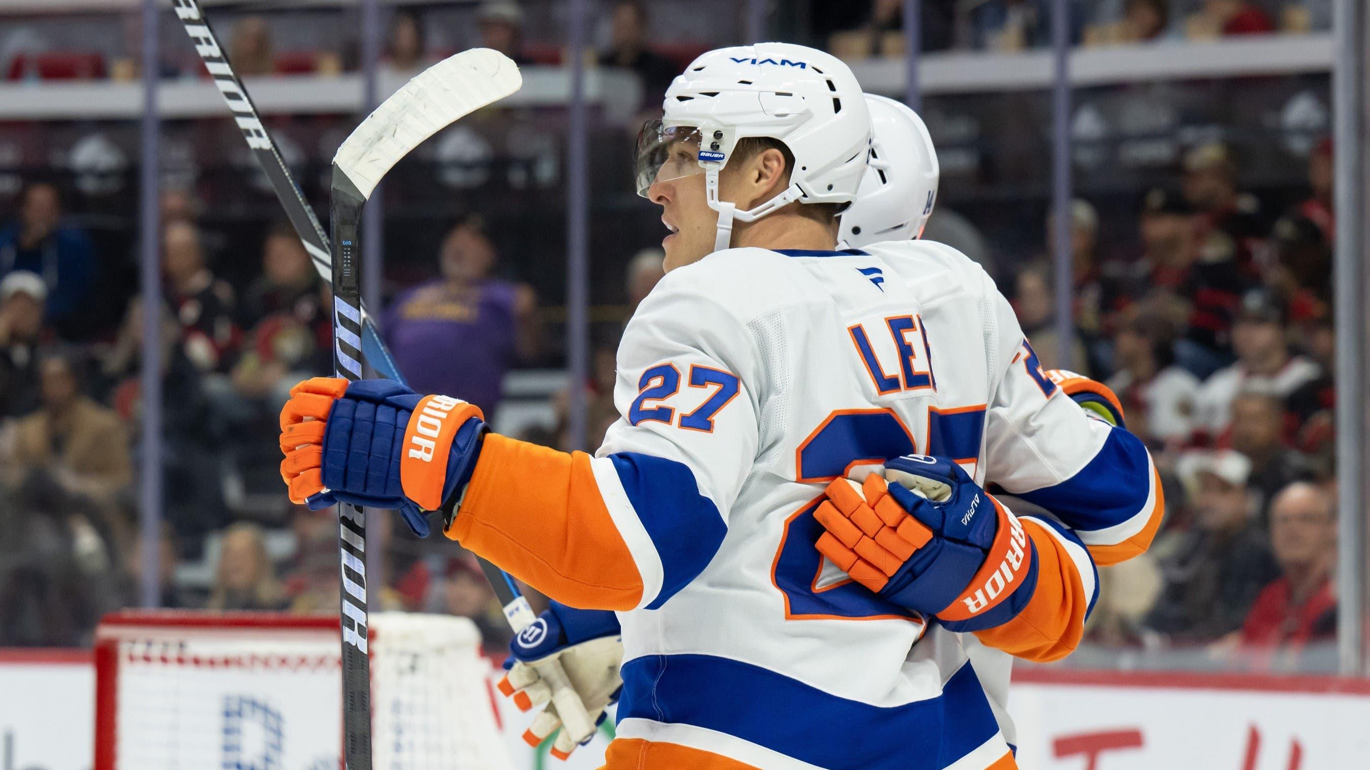 Nov 7, 2024; Ottawa, Ontario, CAN; New York Islanders left wing Anders Lee (27) celebrates his goal scored in the second period against the Ottawa Senators at the Canadian Tire Centre. / Marc DesRosiers-Imagn Images