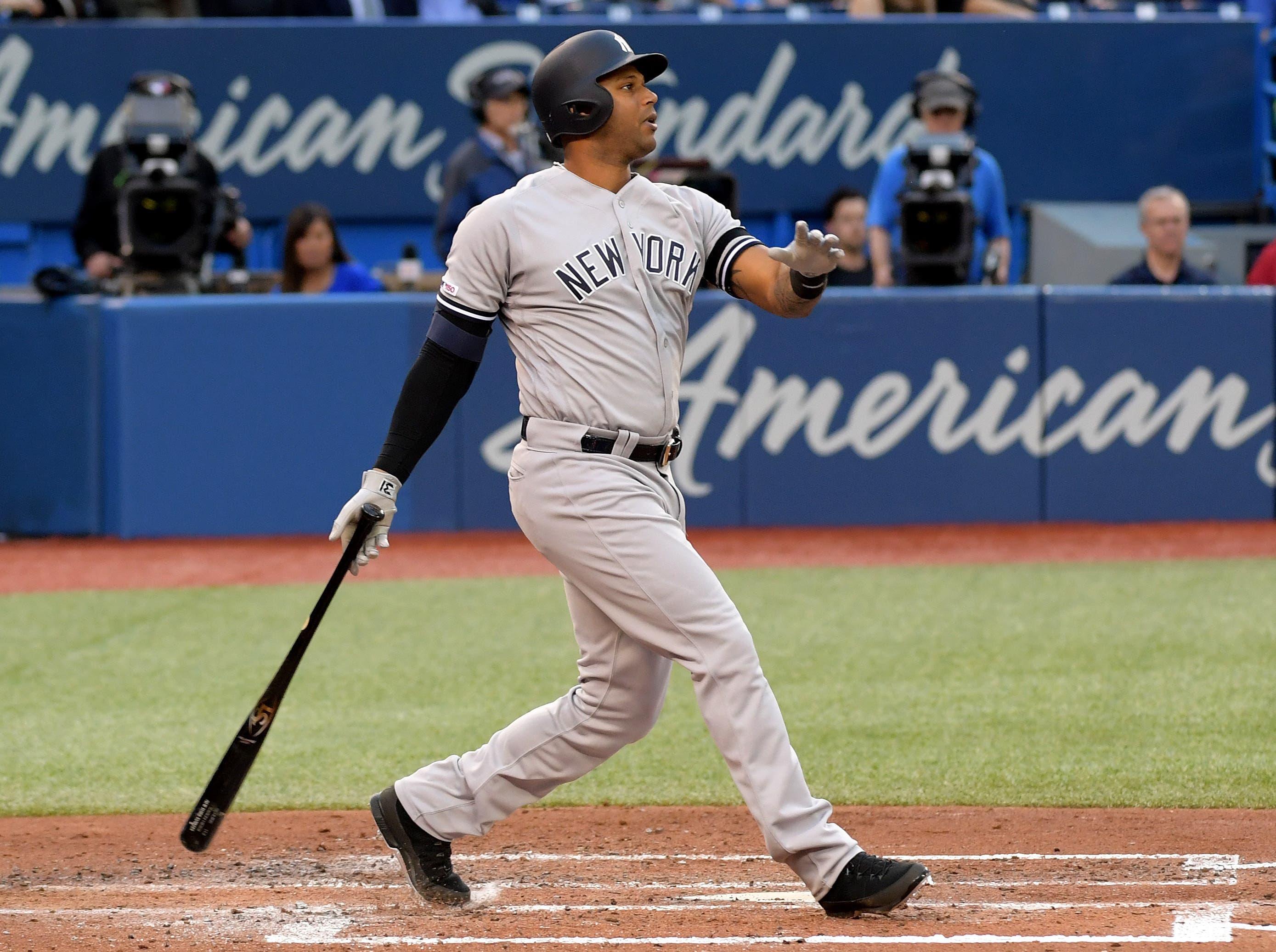 Jun 6, 2019; Toronto, Ontario, CAN; New York Yankees center fielder Aaron Hicks (31) hits a three run home run against Toronto Blue Jays in the second inning at Rogers Centre. Mandatory Credit: Dan Hamilton-USA TODAY Sports / Dan Hamilton