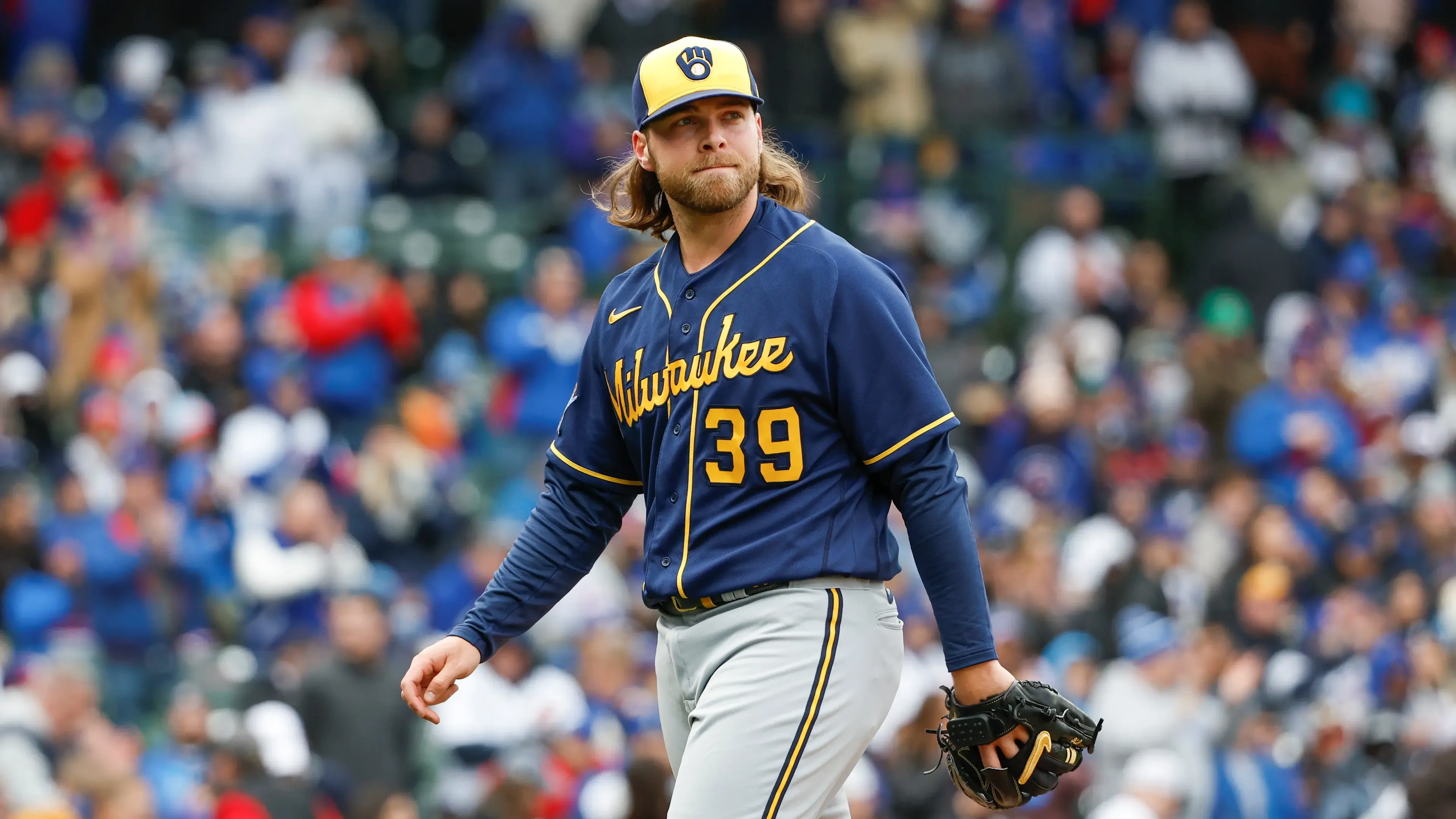Mar 30, 2023; Chicago, Illinois, USA; Milwaukee Brewers starting pitcher Corbin Burnes (39) walks back to dugout after delivering against the Chicago Cubs during the third inning at Wrigley Field. Mandatory Credit: Kamil Krzaczynski-USA TODAY Sports / © Kamil Krzaczynski-USA TODAY Sports