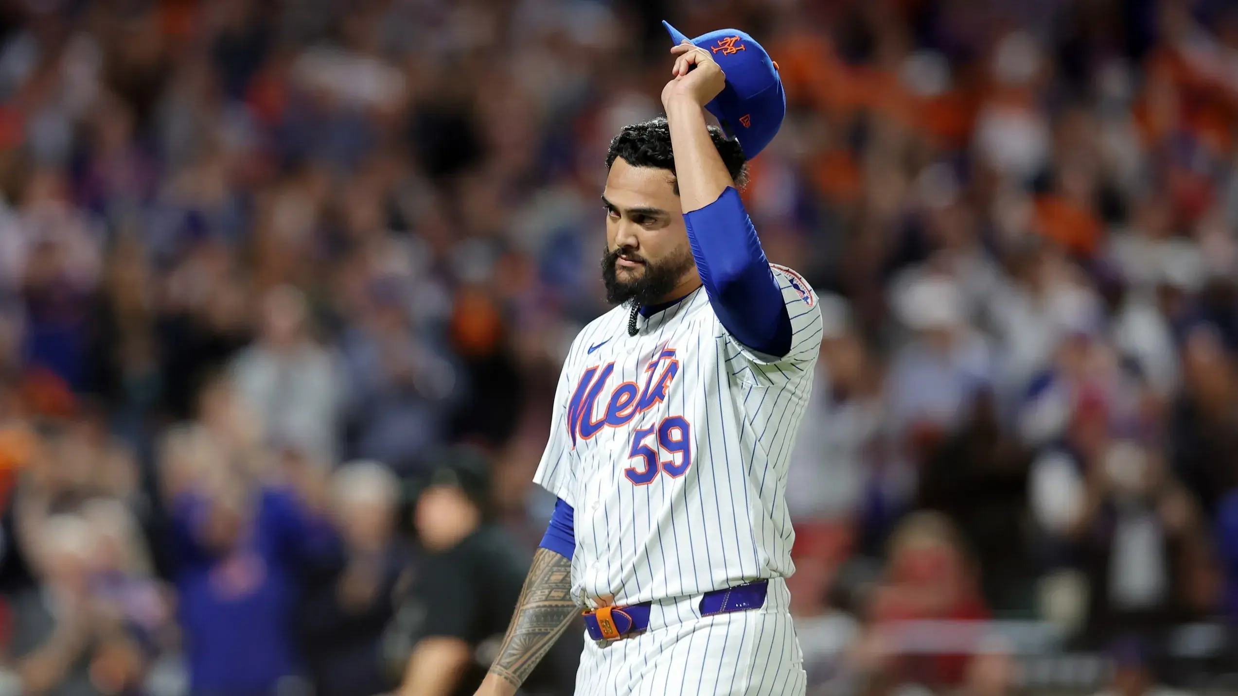 Oct 8, 2024; New York City, New York, USA; New York Mets pitcher Sean Manaea (59) reacts after being relieved in the eighth inning against the Philadelphia Phillies during game three of the NLDS for the 2024 MLB Playoffs at Citi Field. / Brad Penner-Imagn Images