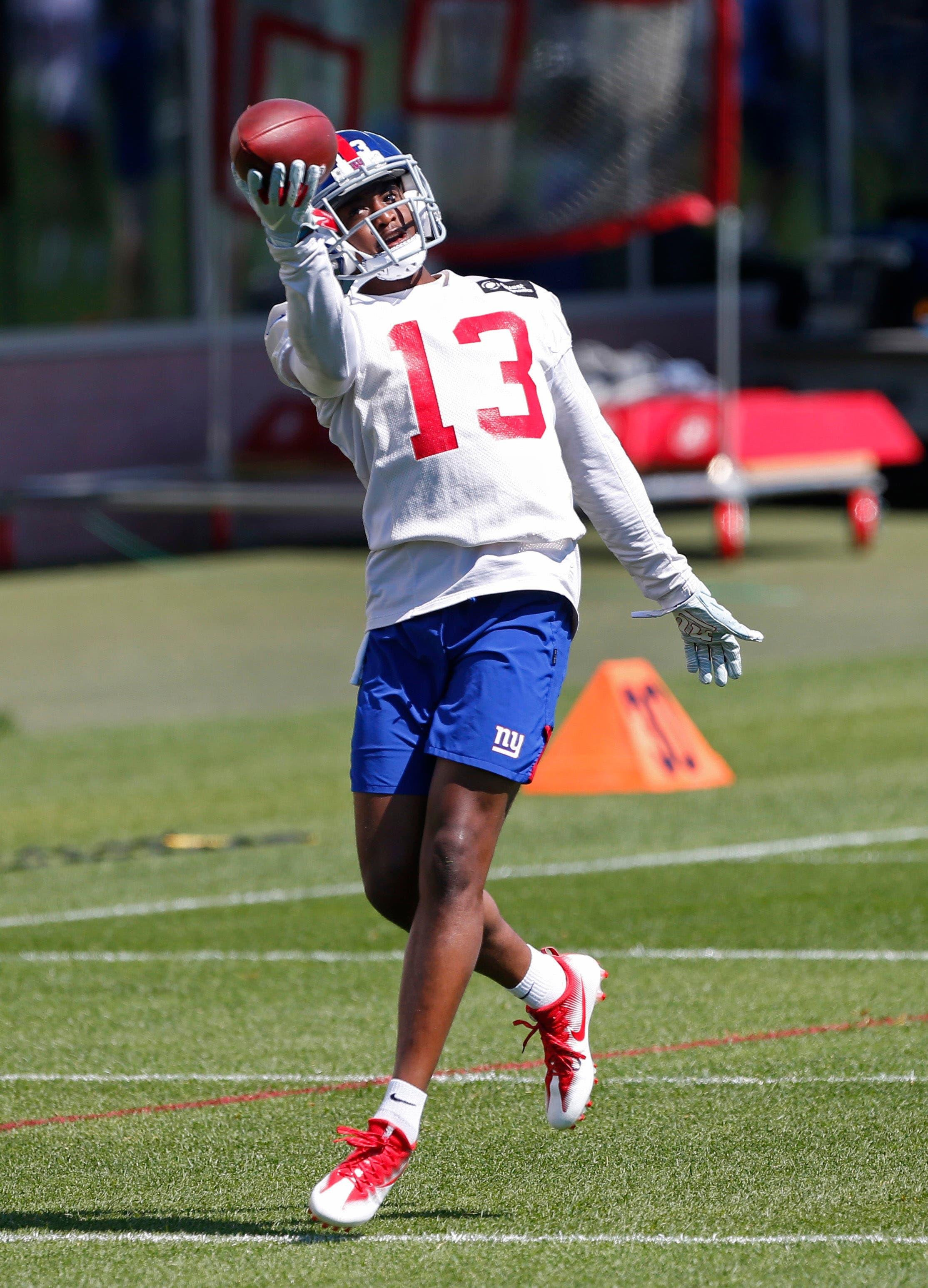 Jun 4, 2019; East Rutherford, NJ, USA; New York Giants wide receiver Reggie White Jr. (13) makes a catch during mini camp at Quest Diagnostic Training Center. Mandatory Credit: Noah K. Murray-USA TODAY Sports / Noah K. Murray