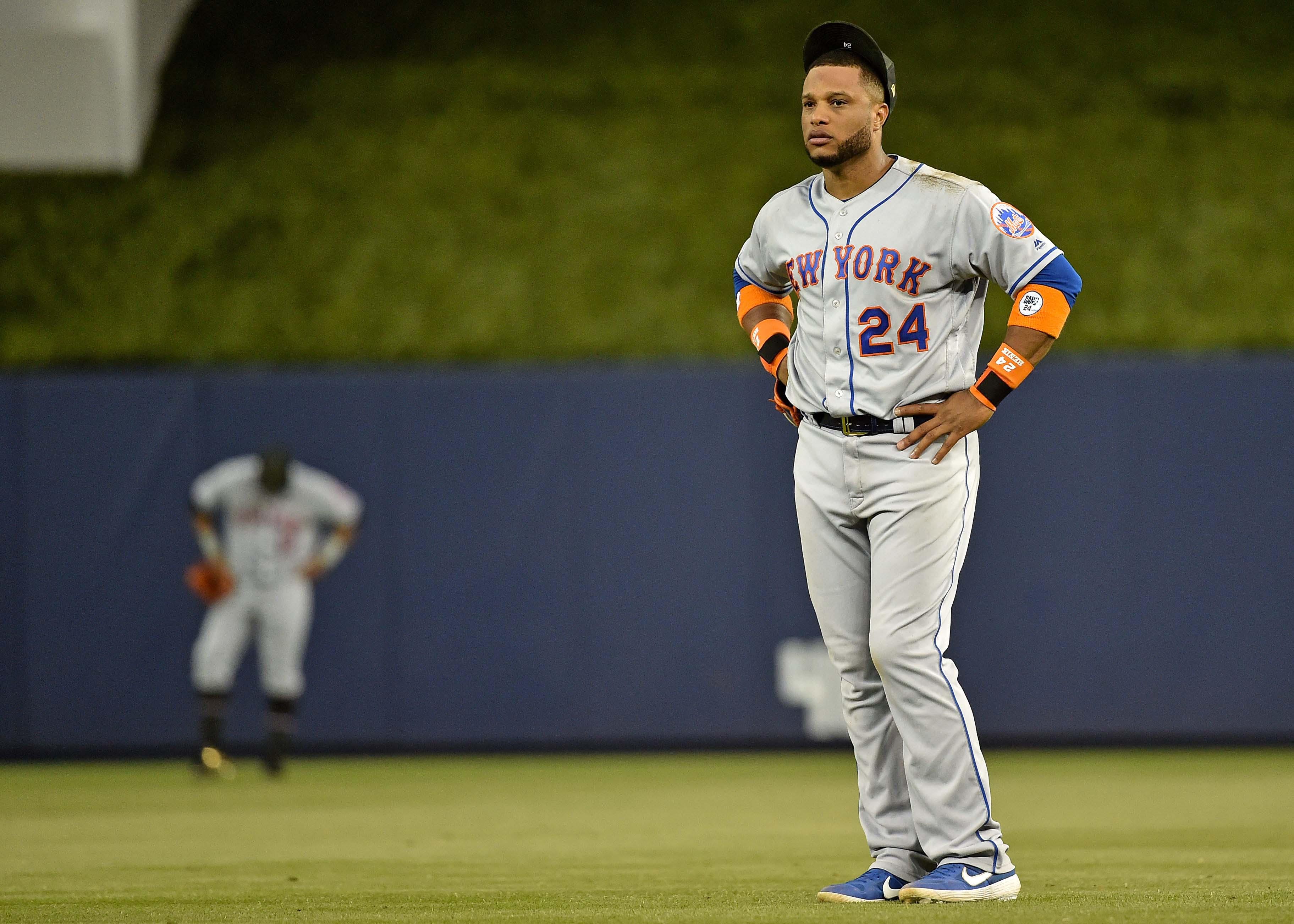 May 17, 2019; Miami, FL, USA; New York Mets second baseman Robinson Cano (24) reacts in the eighth inning against the Miami Marlins at Marlins Park. Mandatory Credit: Steve Mitchell-USA TODAY Sports / Steve Mitchell