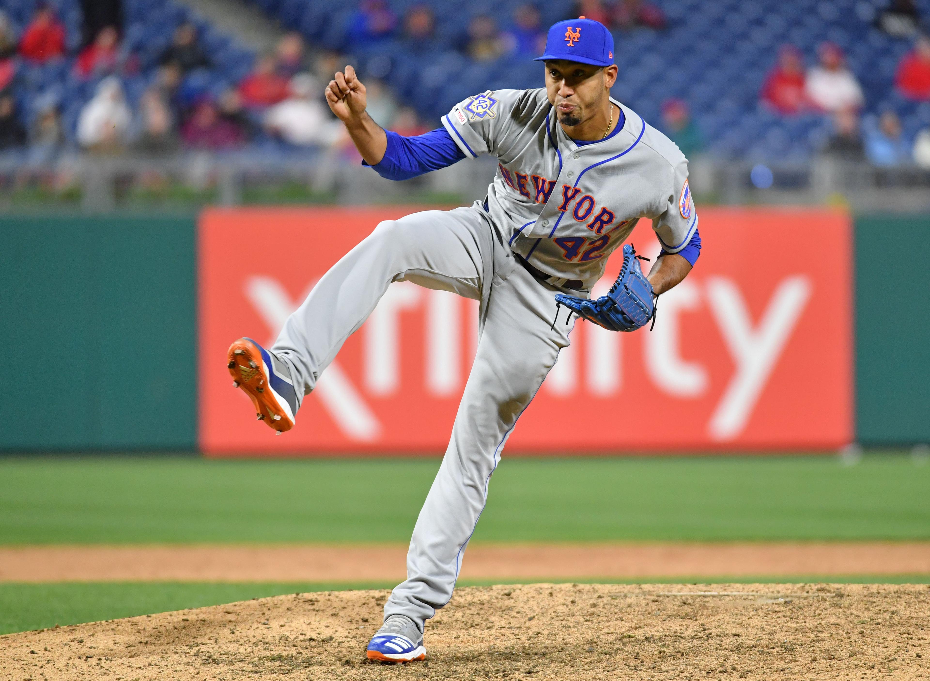 Apr 15, 2019; Philadelphia, PA, USA; New York Mets relief pitcher Edwin Diaz follows through on a pitch against the Philadelphia Phillies during the eleventh inning at Citizens Bank Park. Mandatory Credit: Eric Hartline-USA TODAY Sports