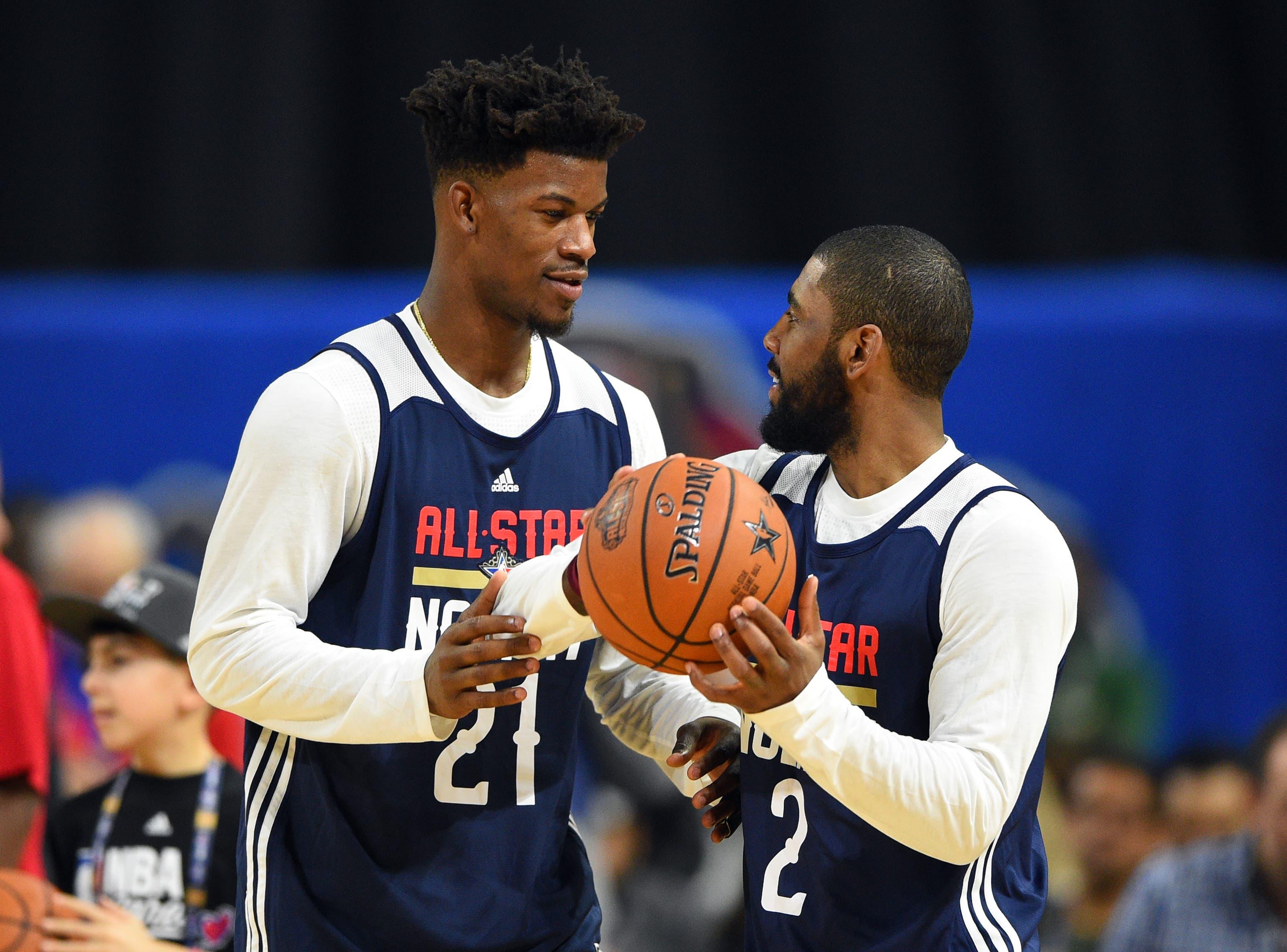 Feb 18, 2017; New Orleans, LA, USA; Eastern Conference guard Jimmy Butler of the Chicago Bulls (21) and Eastern Conference forward Kyrie Irving of the Cleveland Cavaliers (2) talk during the NBA All-Star Practice at the Mercedes-Benz Superdome. Mandatory Credit: Bob Donnan-USA TODAY Sports / Bob Donnan