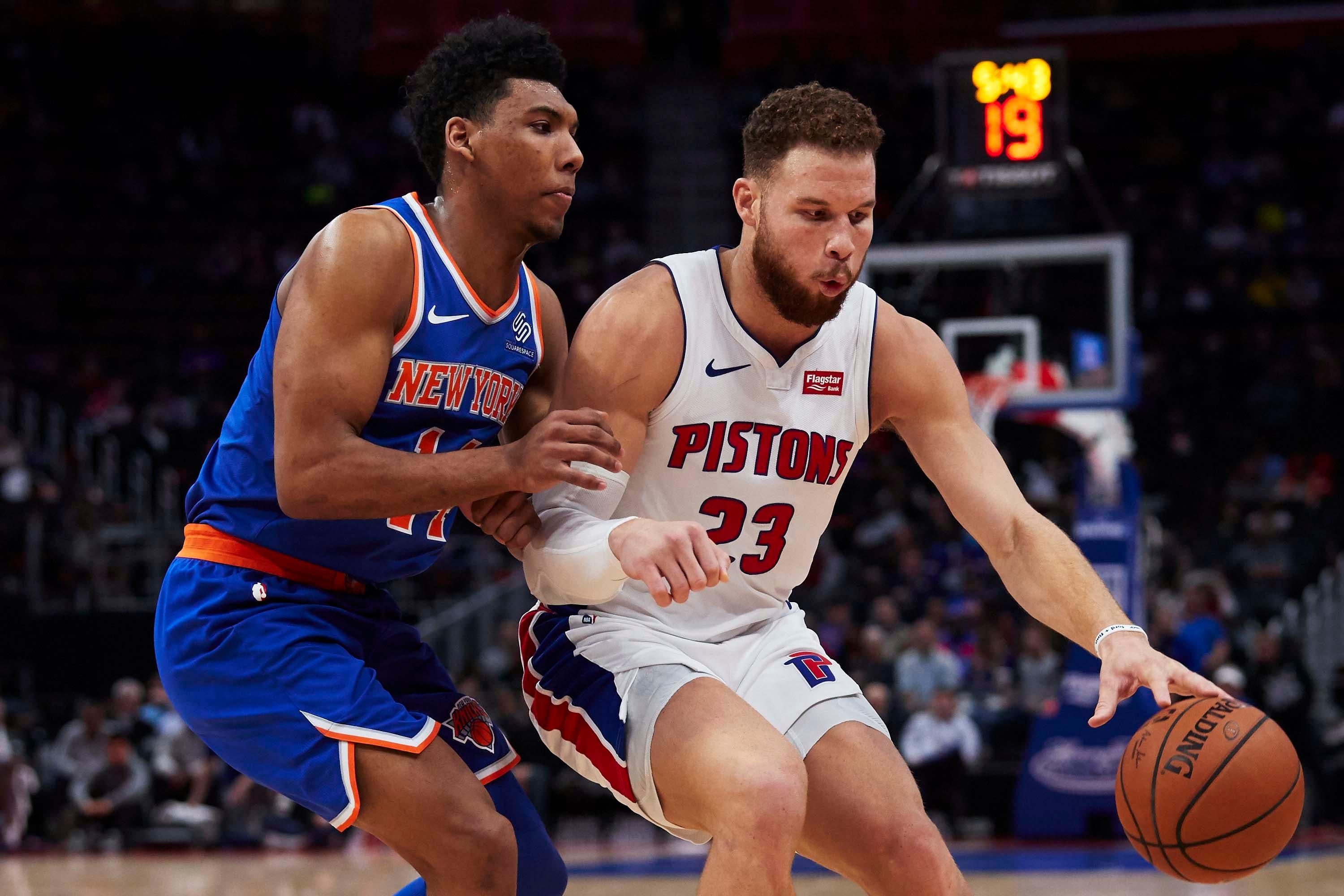 Nov 27, 2018; Detroit, MI, USA; Detroit Pistons forward Blake Griffin (23) dribbles defended by New York Knicks guard Allonzo Trier (14) in the first half at Little Caesars Arena. Mandatory Credit: Rick Osentoski-USA TODAY Sports / Rick Osentoski