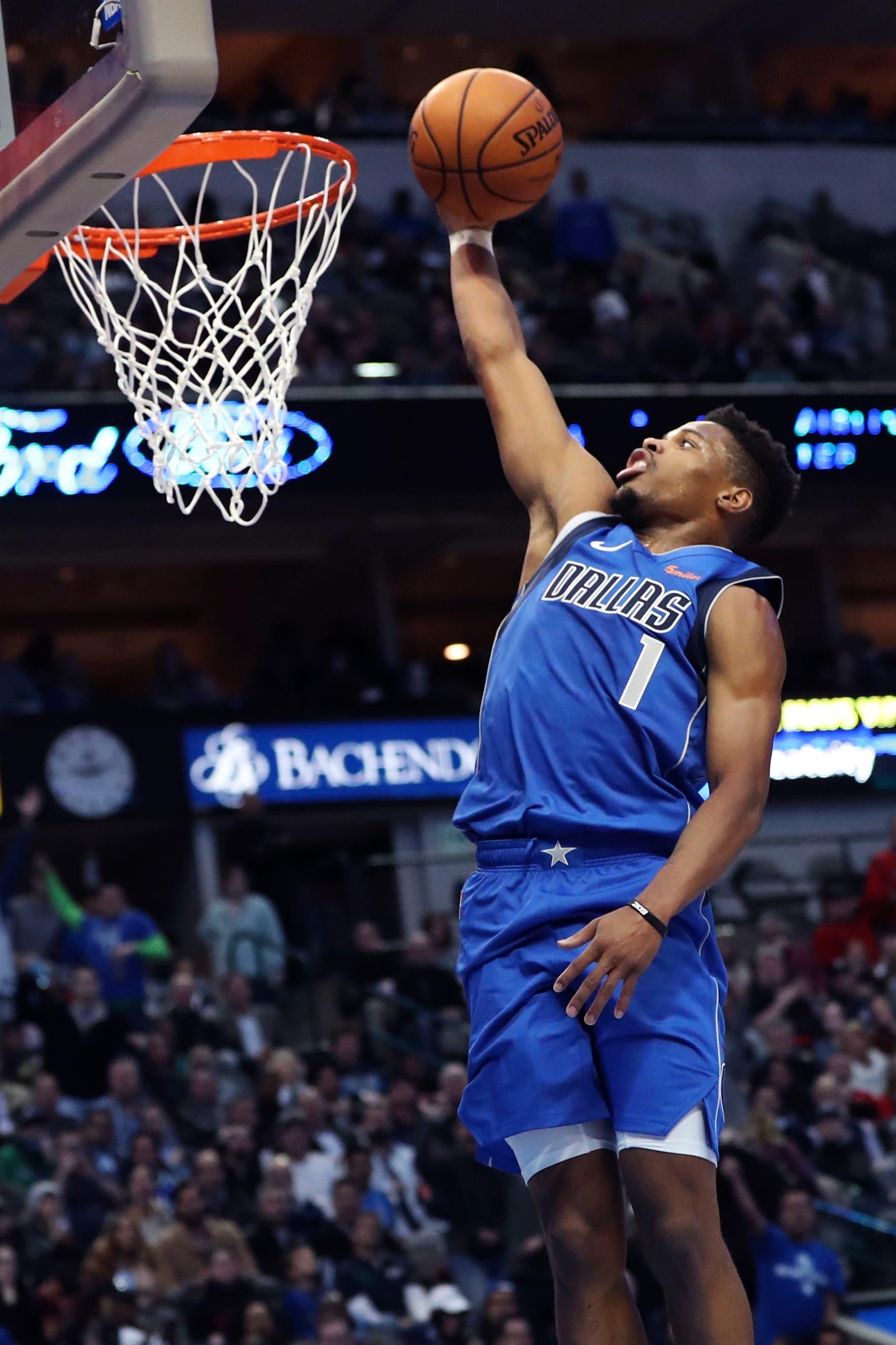 Dallas Mavericks guard Dennis Smith Jr. dunks during the second half against the Portland Trail Blazers at American Airlines Center. / Kevin Jairaj/USA TODAY Sports