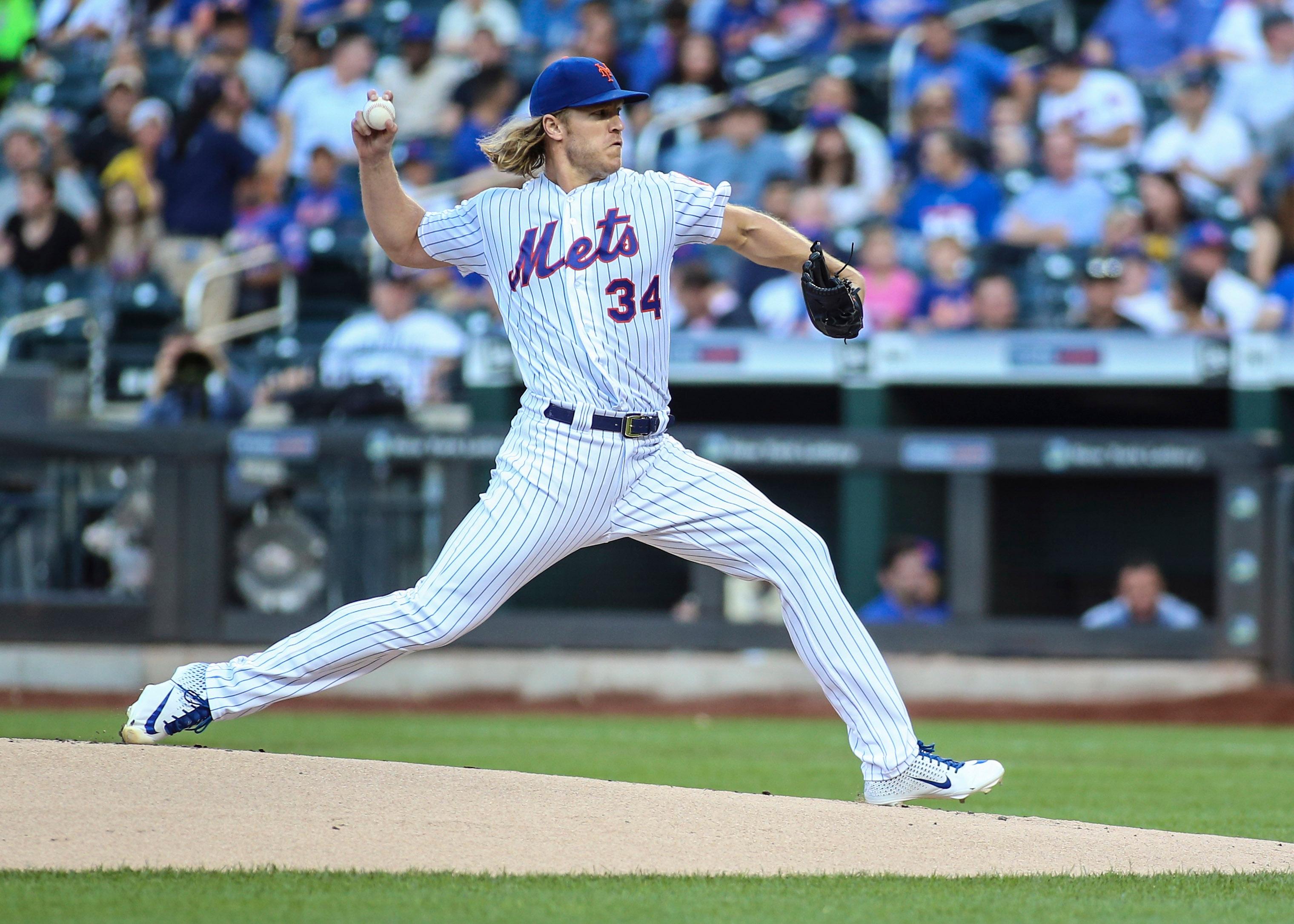 Jul 24, 2019; New York City, NY, USA; New York Mets pitcher Noah Syndergaard (34) pitches in the first inning against the San Diego Padres at Citi Field. Mandatory Credit: Wendell Cruz-USA TODAY Sports