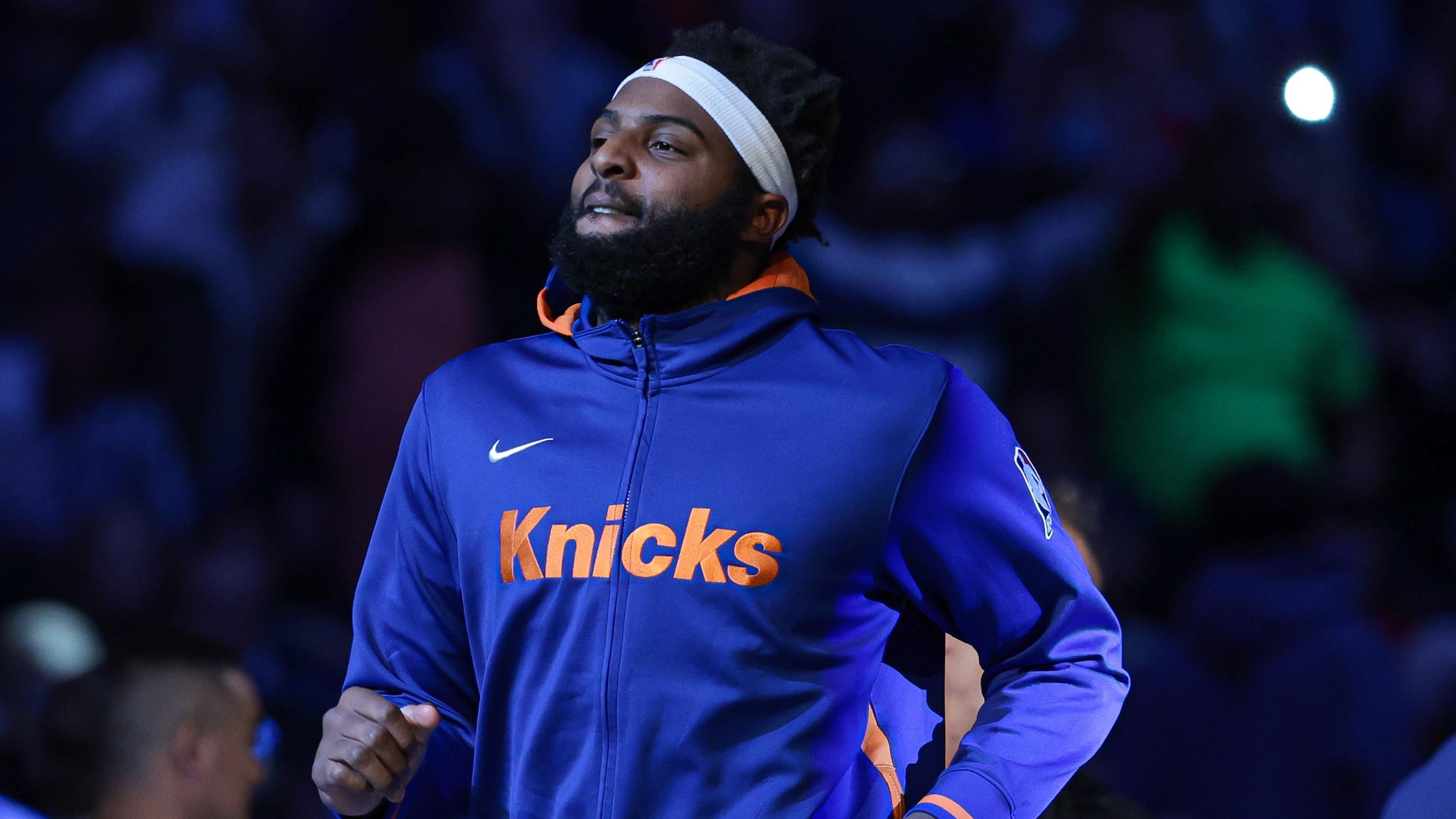 New York Knicks center Mitchell Robinson (23) runs out during introductions before the game against the Washington Wizards at Madison Square Garden / Vincent Carchietta - USA TODAY Sports
