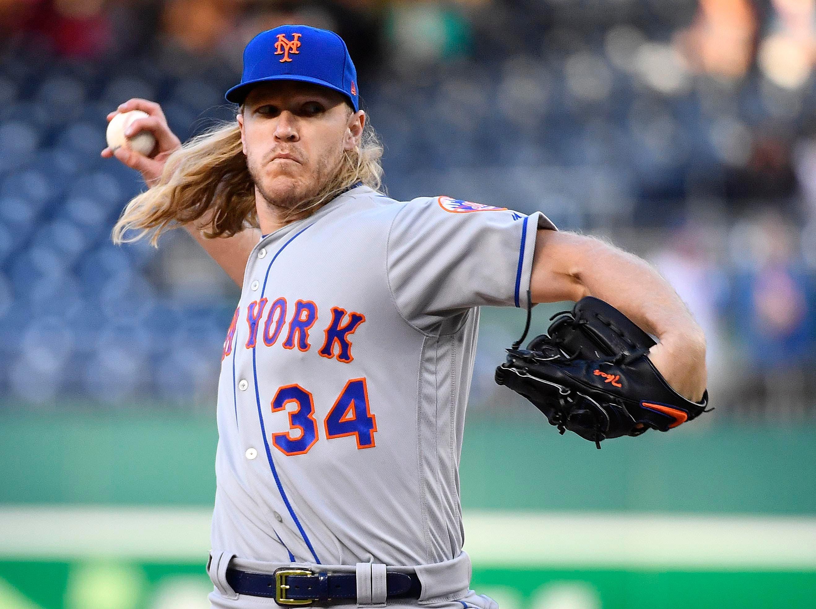 May 14, 2019; Washington, DC, USA; New York Mets starting pitcher Noah Syndergaard (34) throws against the Washington Nationals during the first inning at Nationals Park. Mandatory Credit: Brad Mills-USA TODAY Sports / Brad Mills