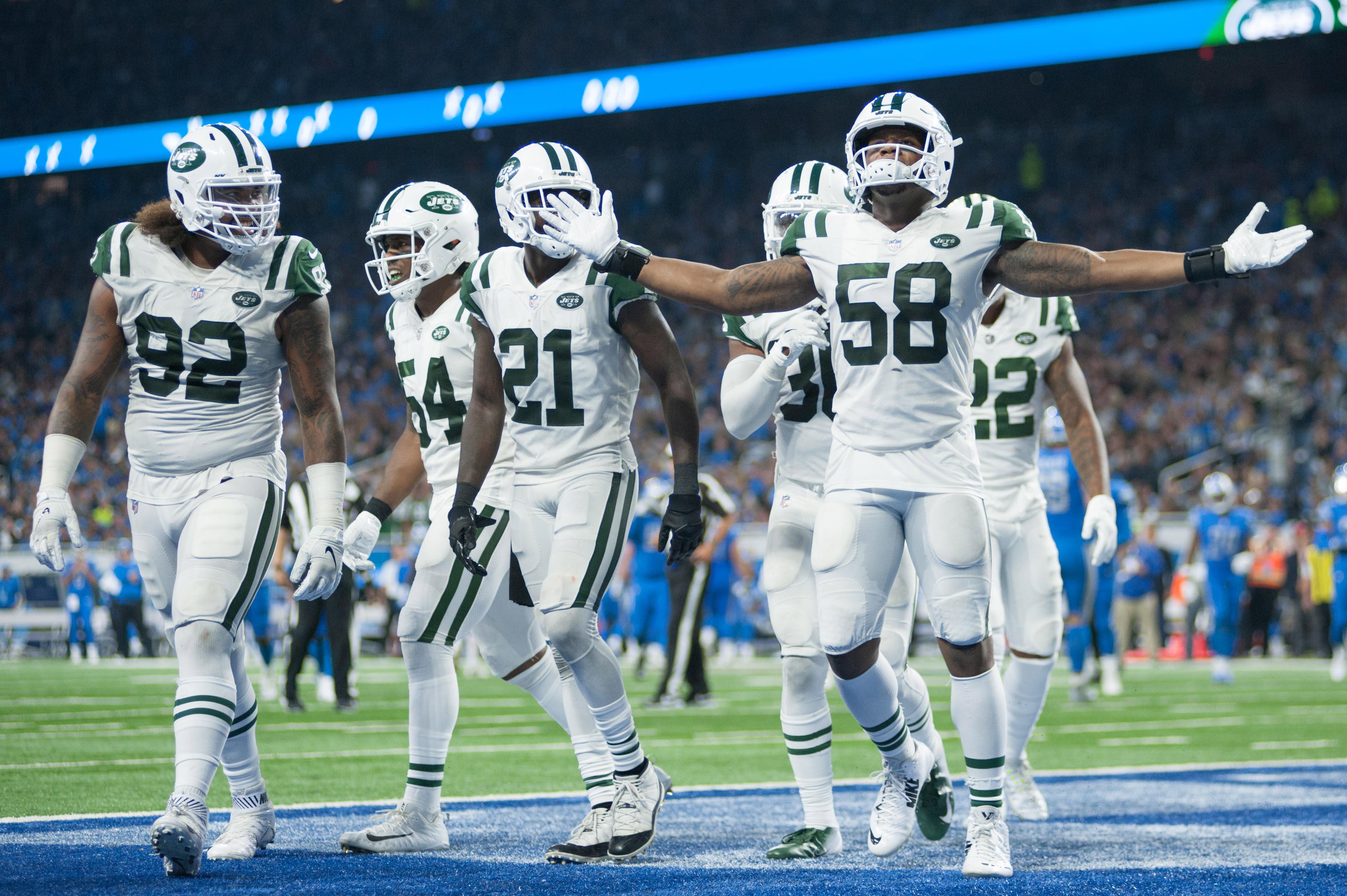 New York Jets linebacker Darron Lee celebrates his touchdown during the third quarter against the Detroit Lions at Ford Field.