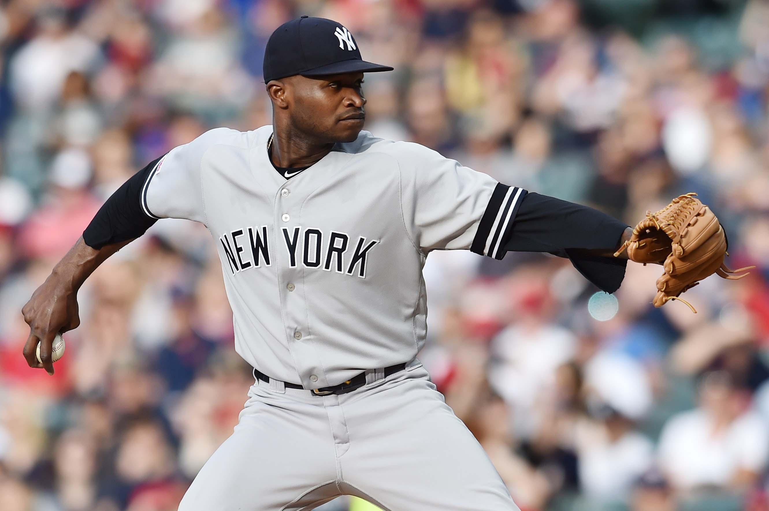 Jun 7, 2019; Cleveland, OH, USA; New York Yankees starting pitcher Domingo German (55) throws a pitch during the first inning against the Cleveland Indians at Progressive Field. Mandatory Credit: Ken Blaze-USA TODAY Sports / Ken Blaze