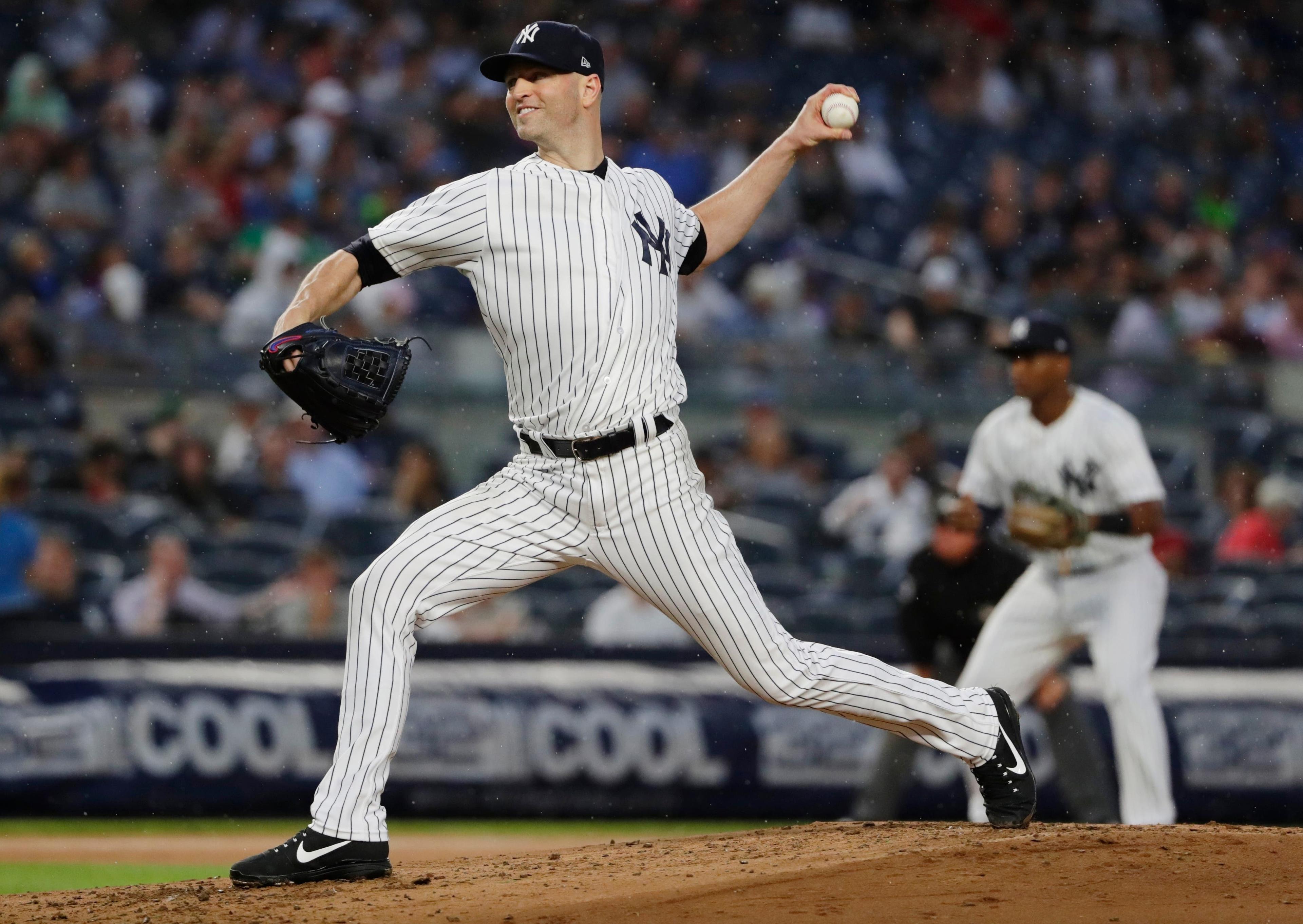 New York Yankees' J.A. Happ delivers a pitch during the first inning of a baseball game against the Tampa Bay Rays Tuesday, Aug. 14, 2018, in New York. (AP Photo/Frank Franklin II) / Frank Franklin II/AP