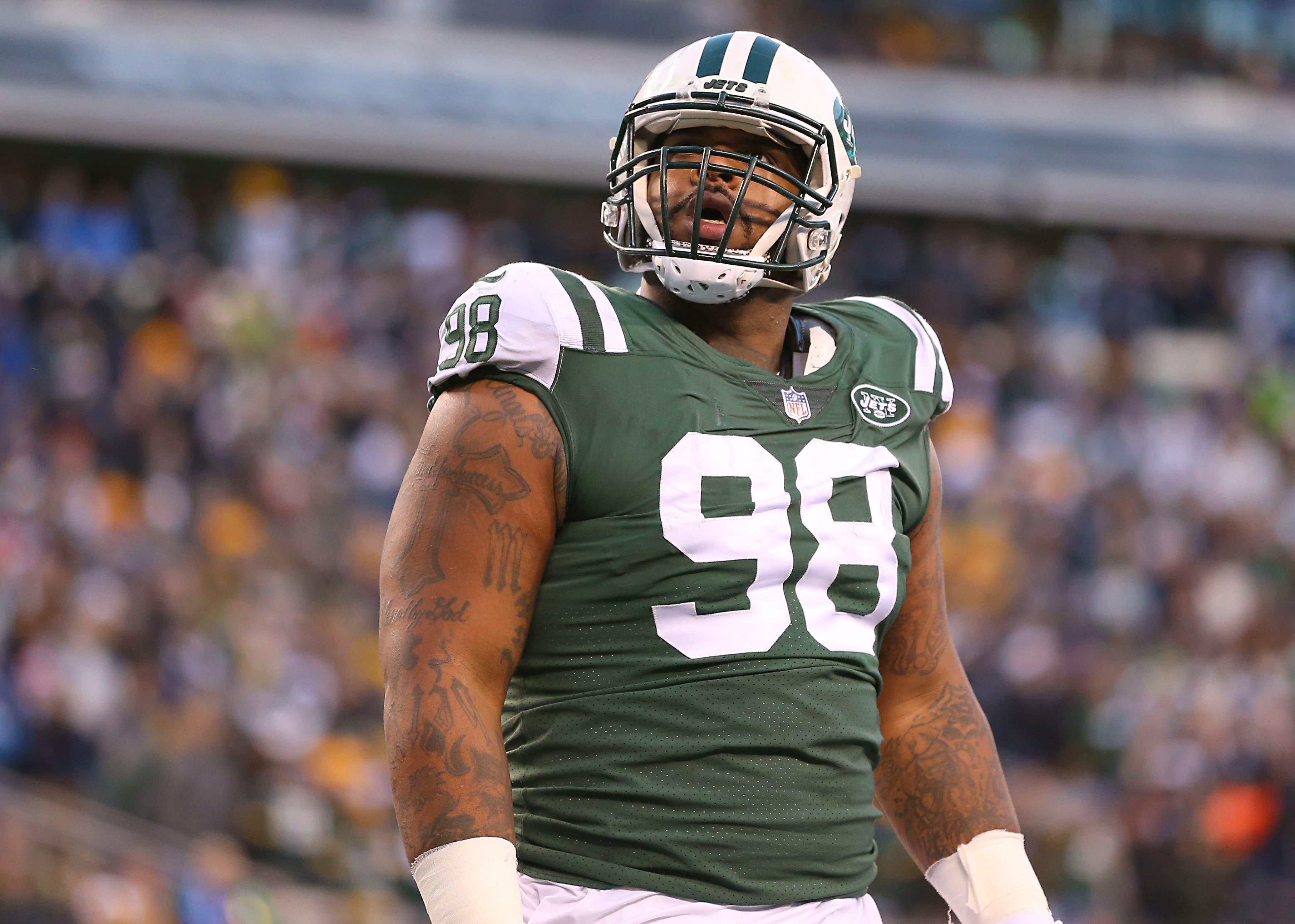 Dec 23, 2018; East Rutherford, NJ, USA; New York Jets defensive tackle Mike Pennel (98) reacts to a replay of a Green Bay Packers touchdown during the second half at MetLife Stadium. Mandatory Credit: Vincent Carchietta-USA TODAY Sports / Vincent Carchietta