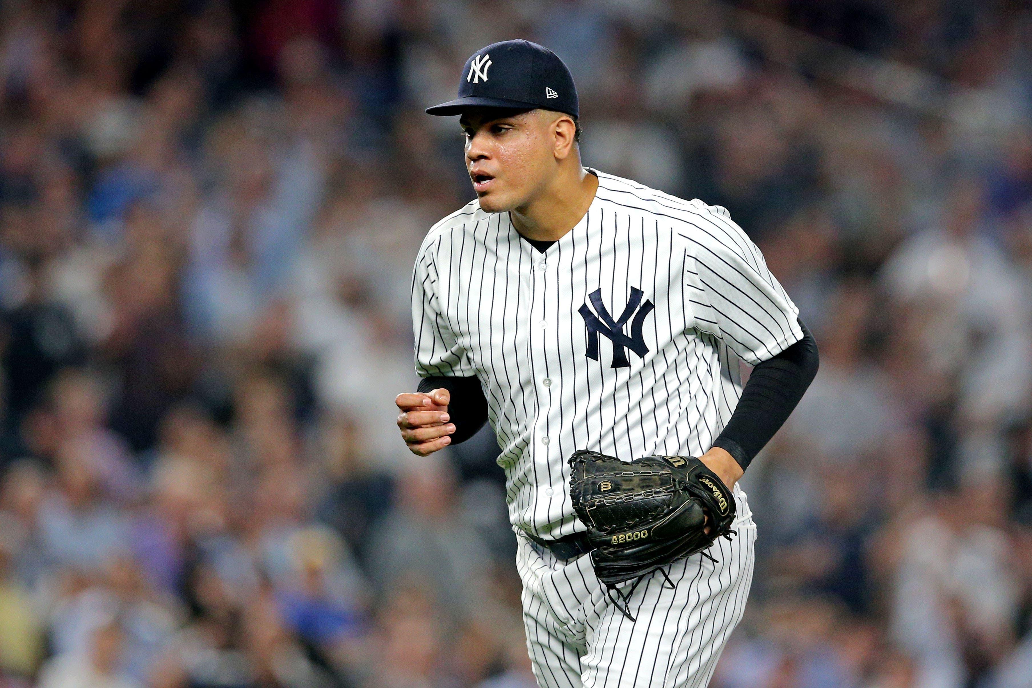 Oct 9, 2018; Bronx, NY, USA; New York Yankees relief pitcher Dellin Betances (68) runs off the field after the during the eighth inning against the Boston Red Sox in game four of the 2018 ALDS playoff baseball series at Yankee Stadium. Mandatory Credit: Brad Penner-USA TODAY Sports / Brad Penner