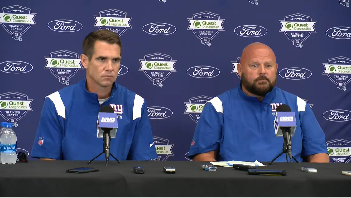 Joe Schoen and Brian Daboll at press conference on day one of training camp in blue jackets / New York Giants