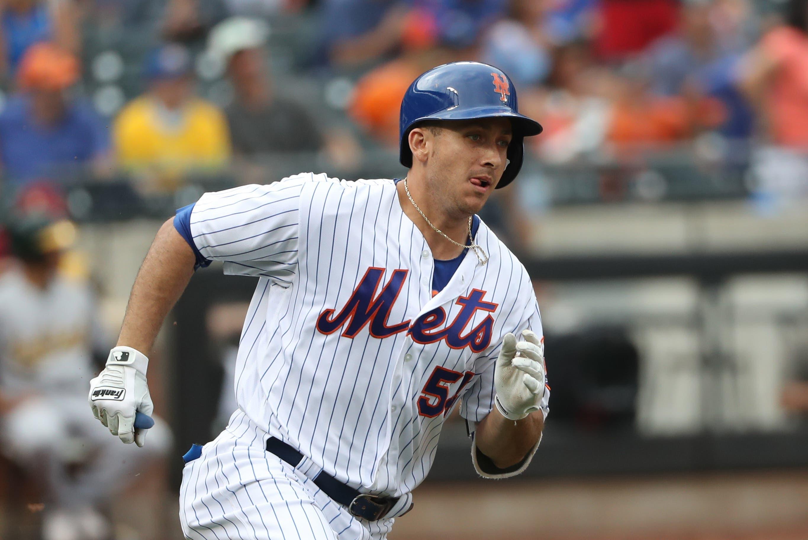 New York Mets third baseman T.J. Rivera doubles to shallow left advancing a man during the sixth inning against the Oakland Athletics at Citi Field. / Anthony Gruppuso/USA TODAY Sports