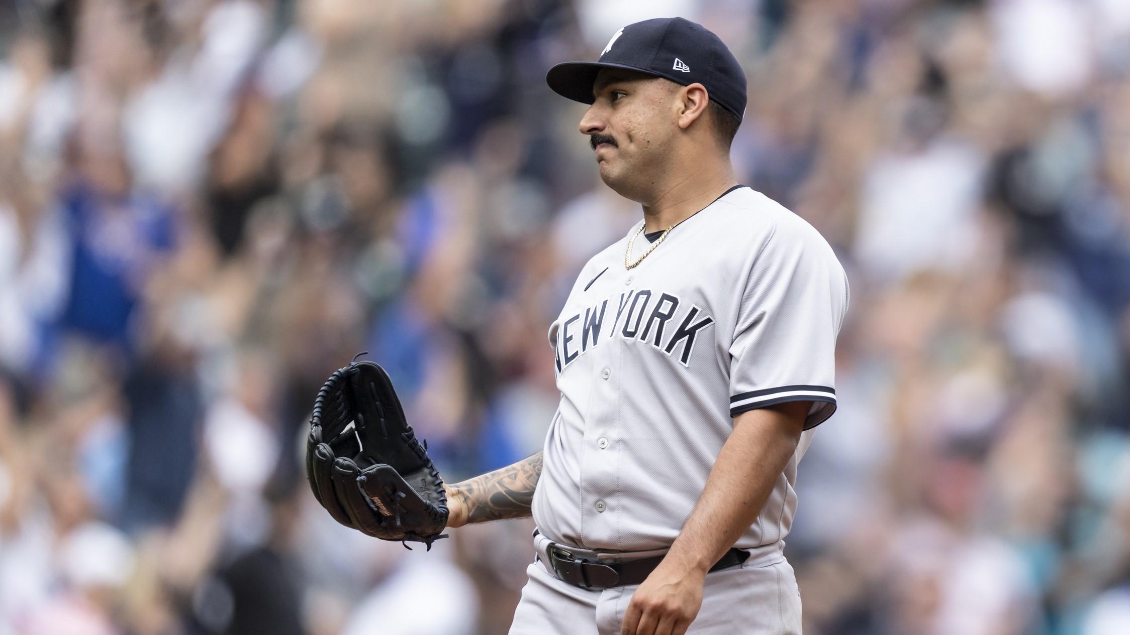 Aug 10, 2022; Seattle, Washington, USA; New York Yankees starting pitcher Nestor Cortes (65) reacts after giving up a solo home run Seattle Mariners leftfielder Sam Haggerty (0) during the sixth inning at T-Mobile Park