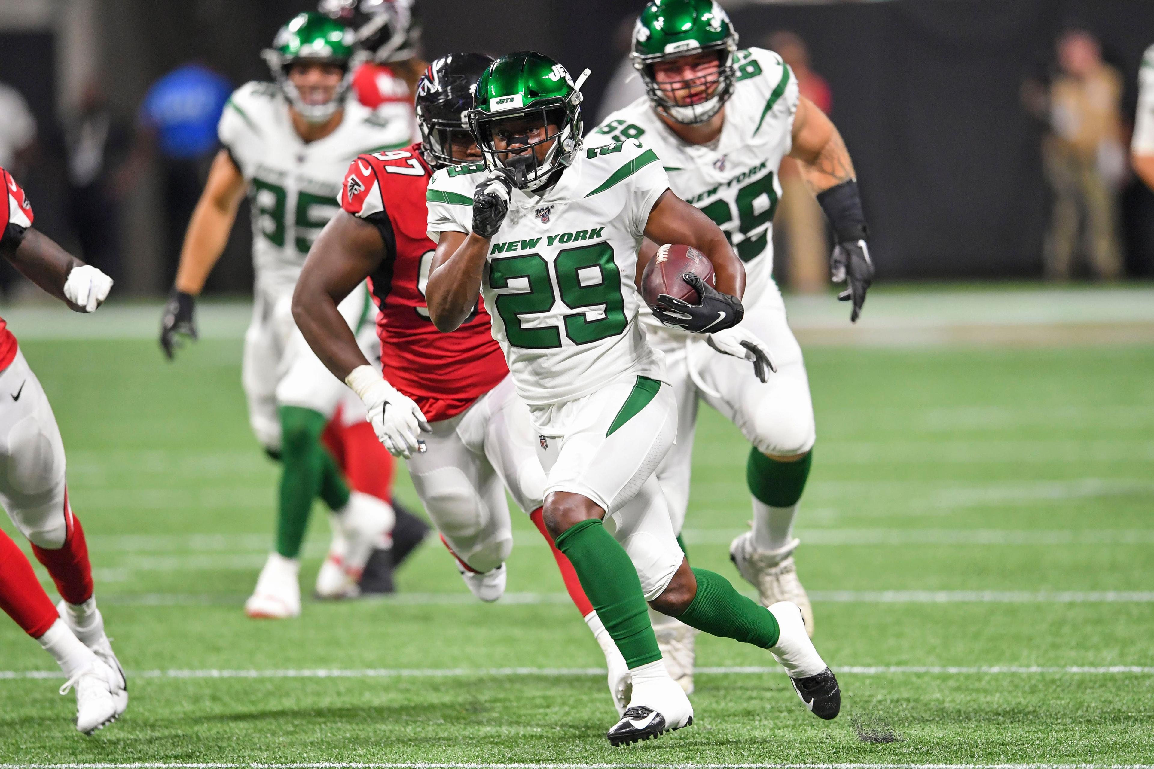 Aug 15, 2019; Atlanta, GA, USA; New York Jets running back Bilal Powell (29) runs against the Atlanta Falcons during the first half at Mercedes-Benz Stadium. Mandatory Credit: Dale Zanine-USA TODAY Sports / Dale Zanine