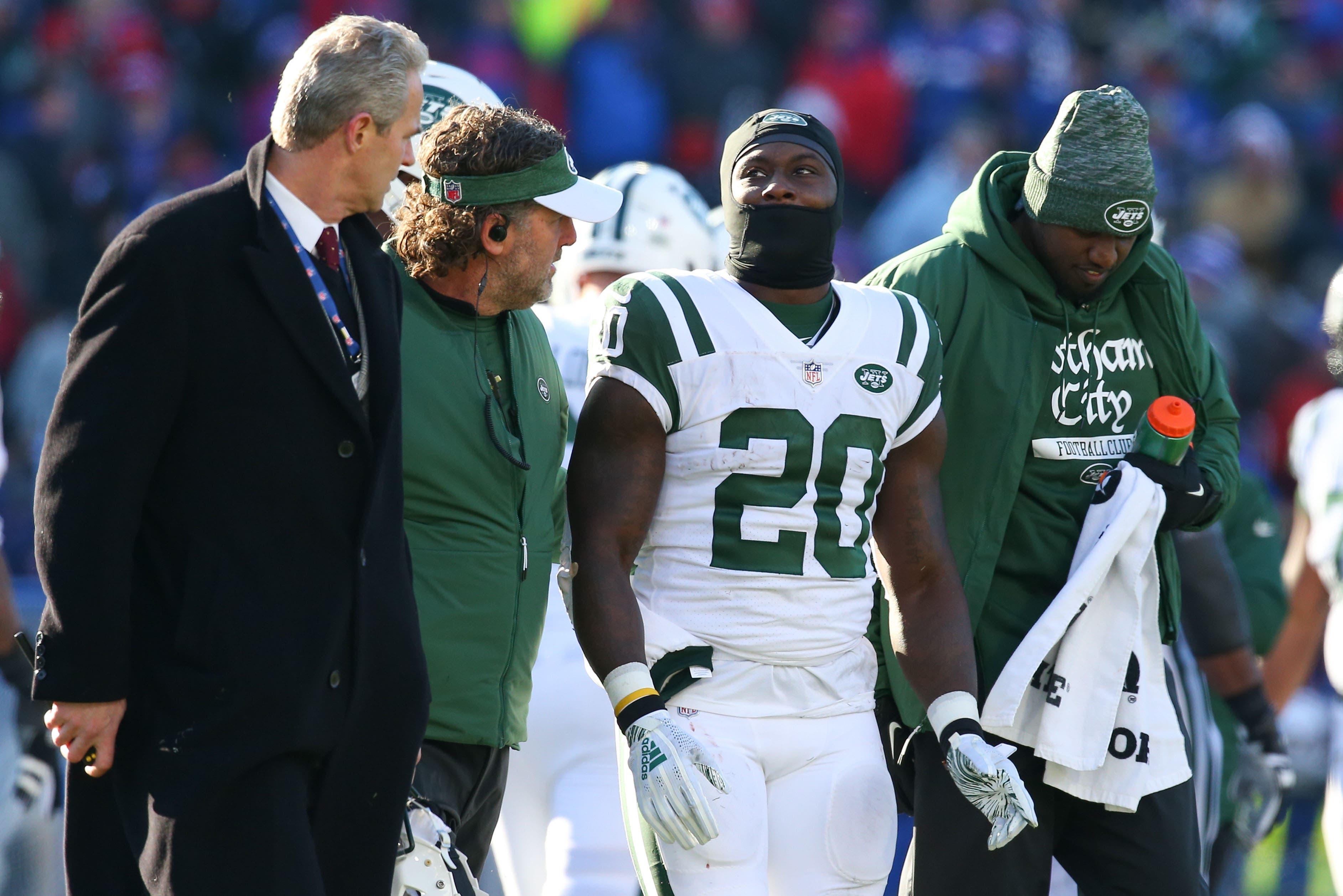 New York Jets running back Isaiah Crowell is escorted off the field after being injured against the Buffalo Bills during the first quarter at New Era Field. / Rich Barnes/USA TODAY Sports