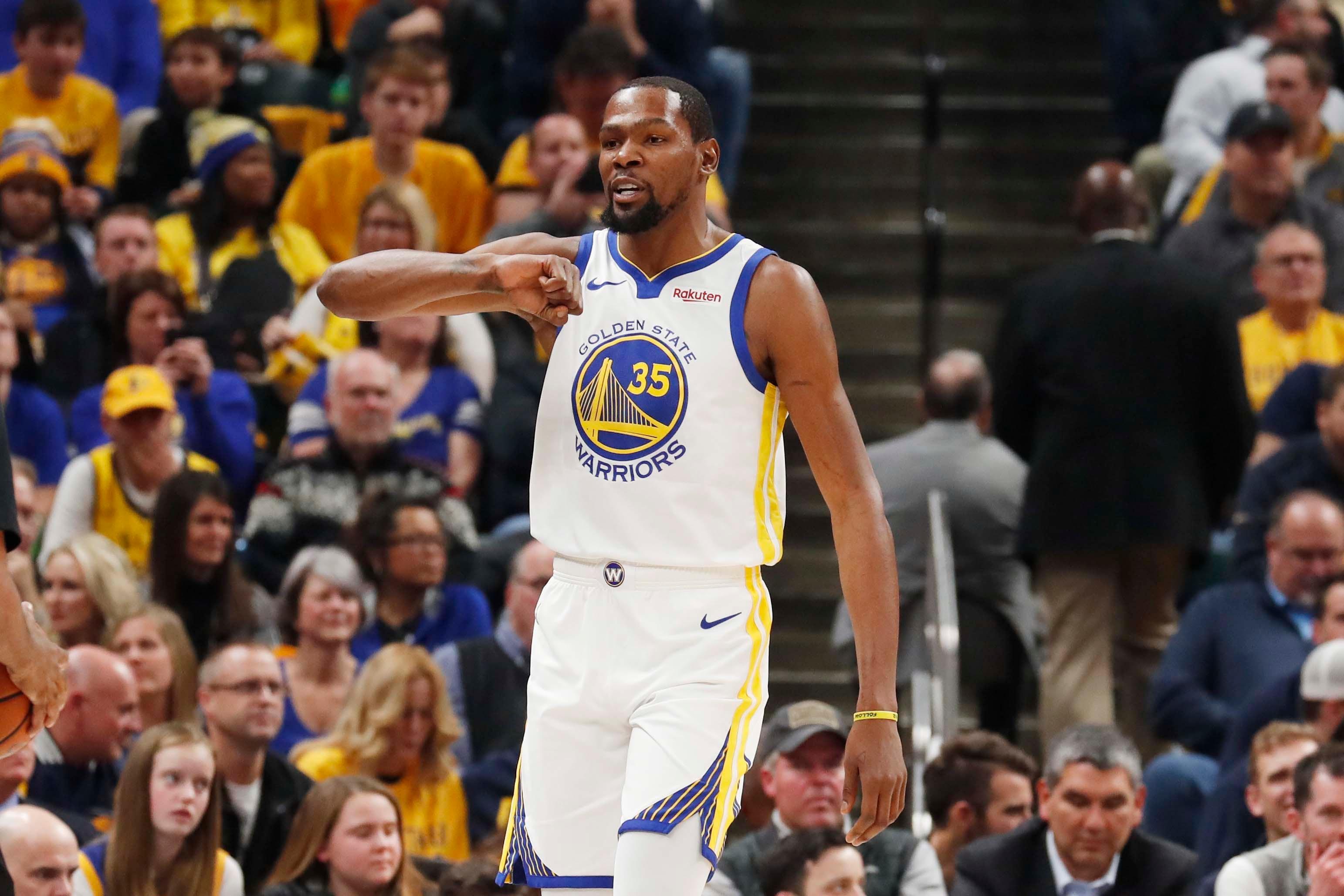 Jan 28, 2019; Indianapolis, IN, USA; Golden State Warriors forward Kevin Durant (35) reacts by pounding on his chest after making a play against the Indiana Pacers during the first quarter at Bankers Life Fieldhouse. Mandatory Credit: Brian Spurlock-USA TODAY Sports