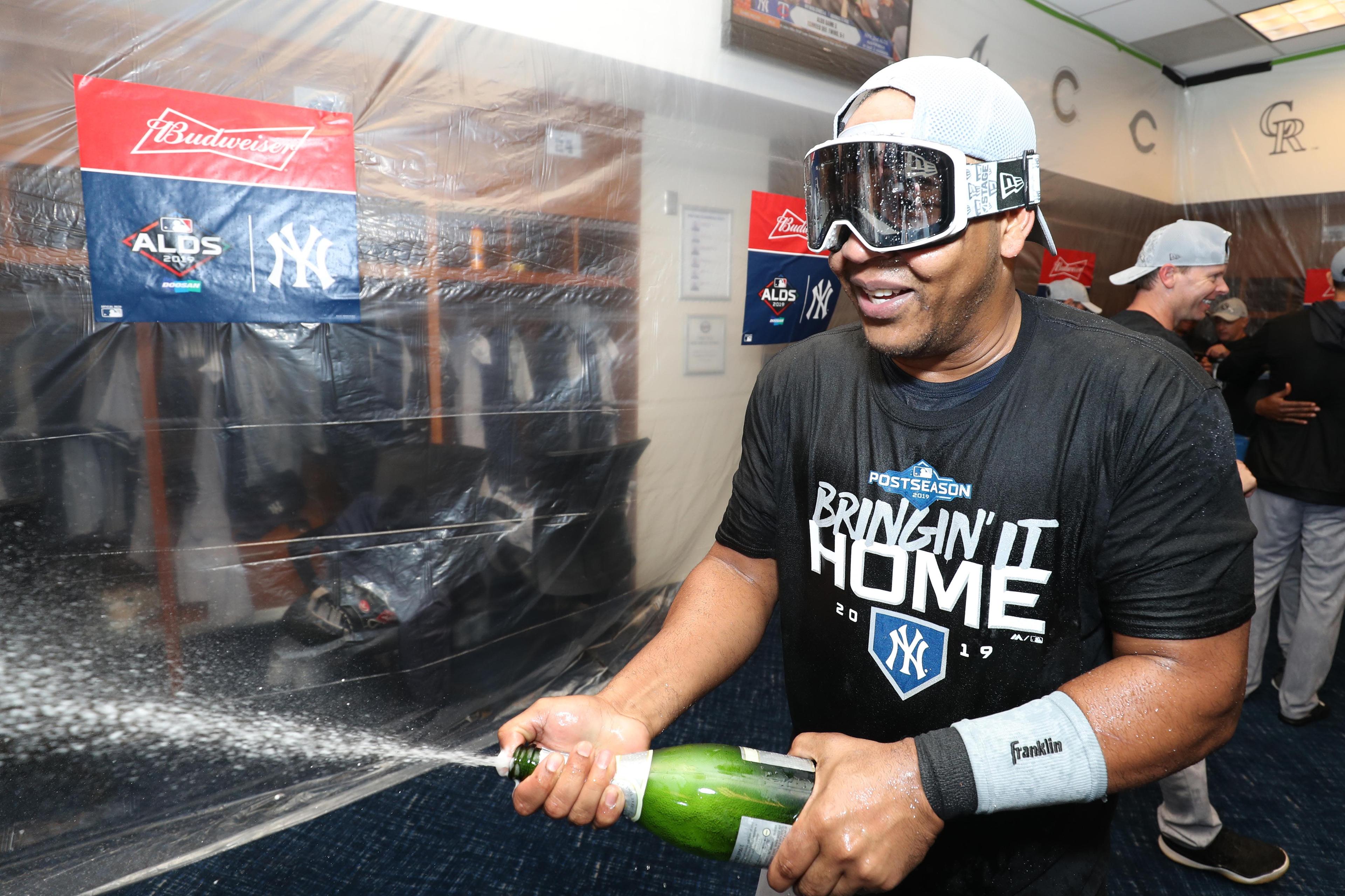 Oct 7, 2019; Minneapolis, MN, USA; The New York Yankees celebrate their victory in the locker room after defeating the Minnesota Twins in game three of the 2019 ALDS playoff baseball series at Target Field. Mandatory Credit: Jesse Johnson-USA TODAY Sports / Jesse Johnson