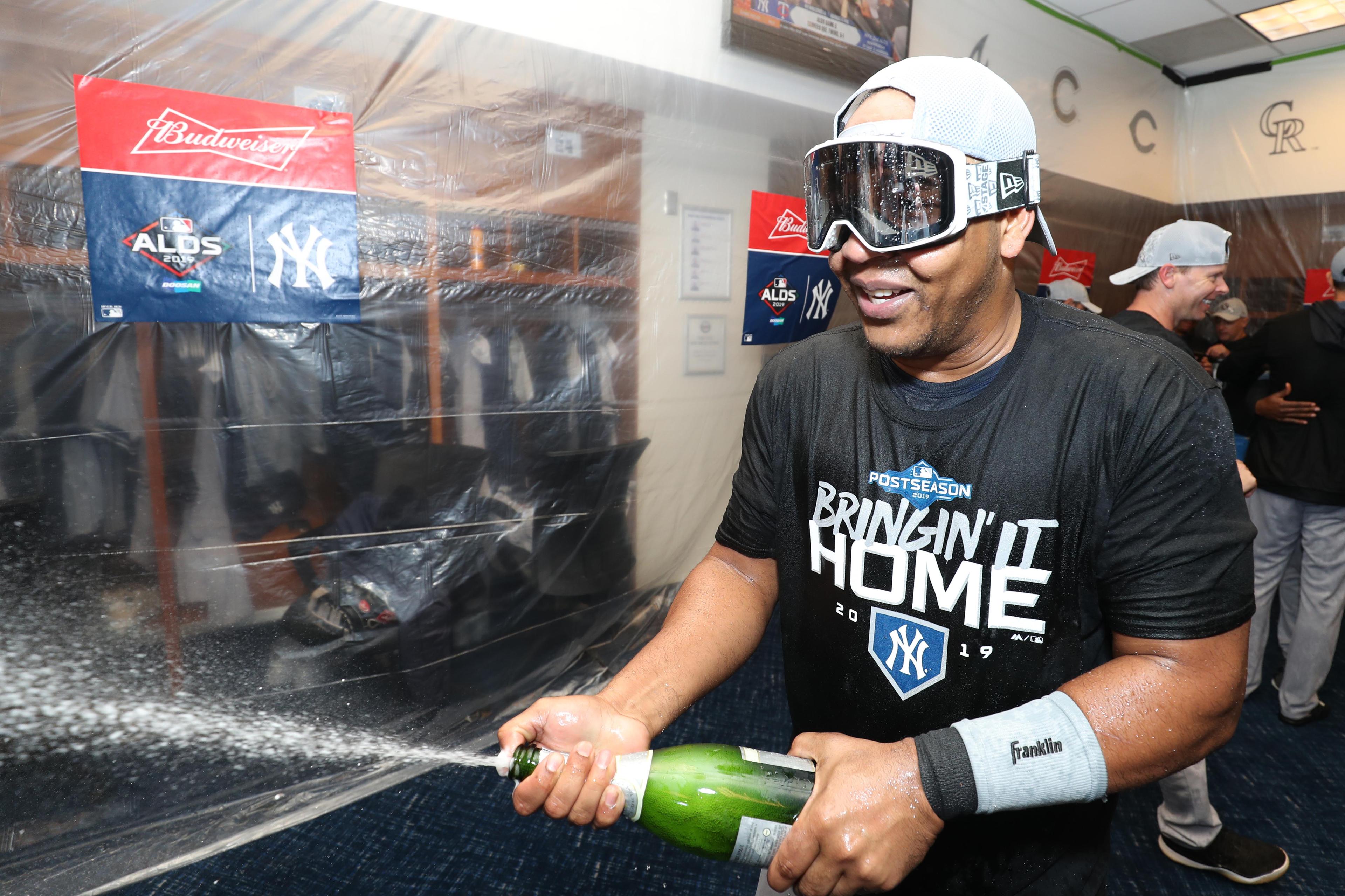 Oct 7, 2019; Minneapolis, MN, USA; The New York Yankees celebrate their victory in the locker room after defeating the Minnesota Twins in game three of the 2019 ALDS playoff baseball series at Target Field. Mandatory Credit: Jesse Johnson-USA TODAY Sports