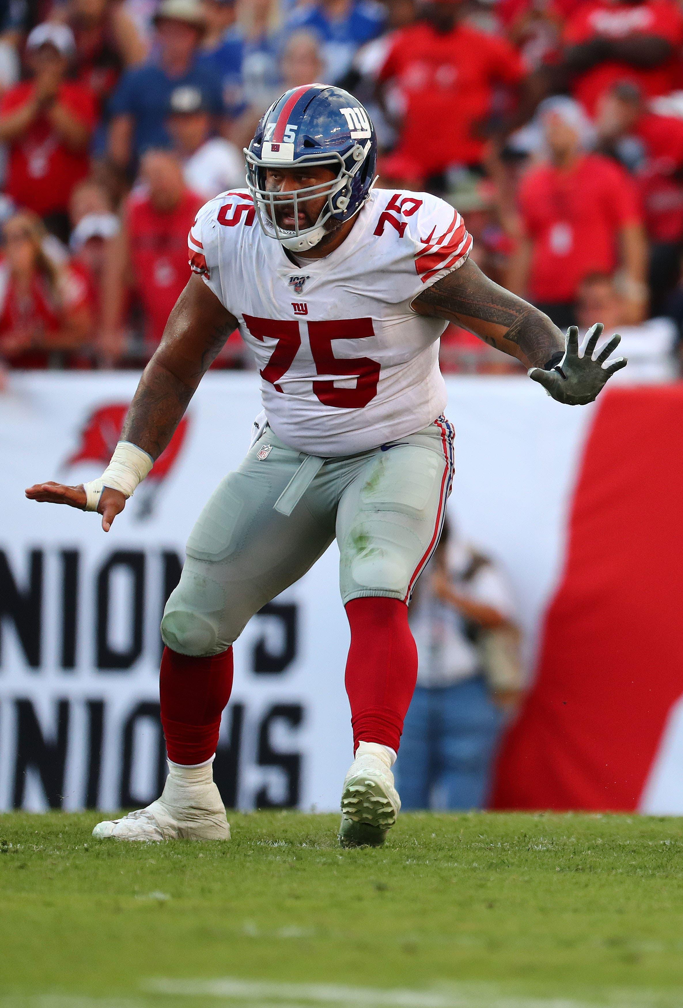 Sep 22, 2019; Tampa, FL, USA; New York Giants center Jon Halapio (75) blocks during the second half at Raymond James Stadium. Mandatory Credit: Kim Klement-USA TODAY Sports / Kim Klement