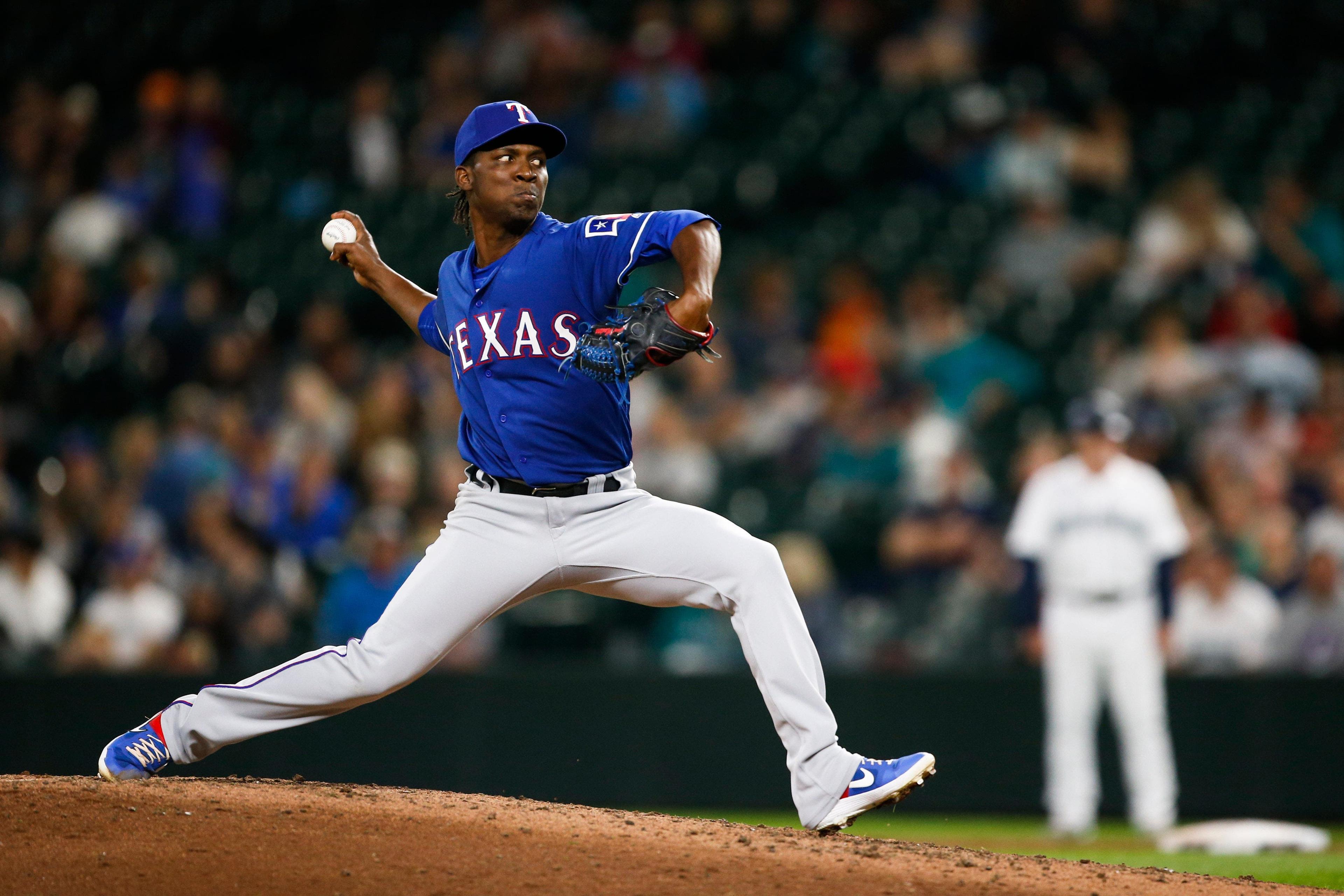 Jul 23, 2019; Seattle, WA, USA; Texas Rangers relief pitcher Rafael Montero (51) throws against the Seattle Mariners during the eighth inning at T-Mobile Park. Mandatory Credit: Joe Nicholson-USA TODAY Sports / Joe Nicholson