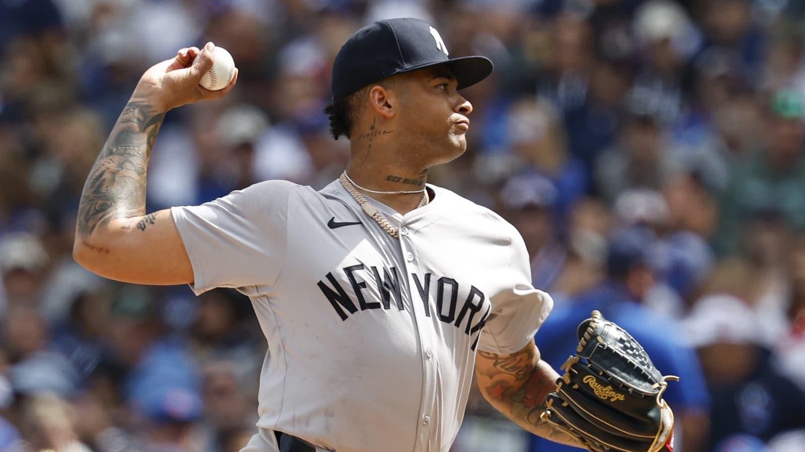 New York Yankees starting pitcher Luis Gil (81) delivers a pitch against the Chicago Cubs during the first inning at Wrigley Field. / Kamil Krzaczynski-Imagn Images