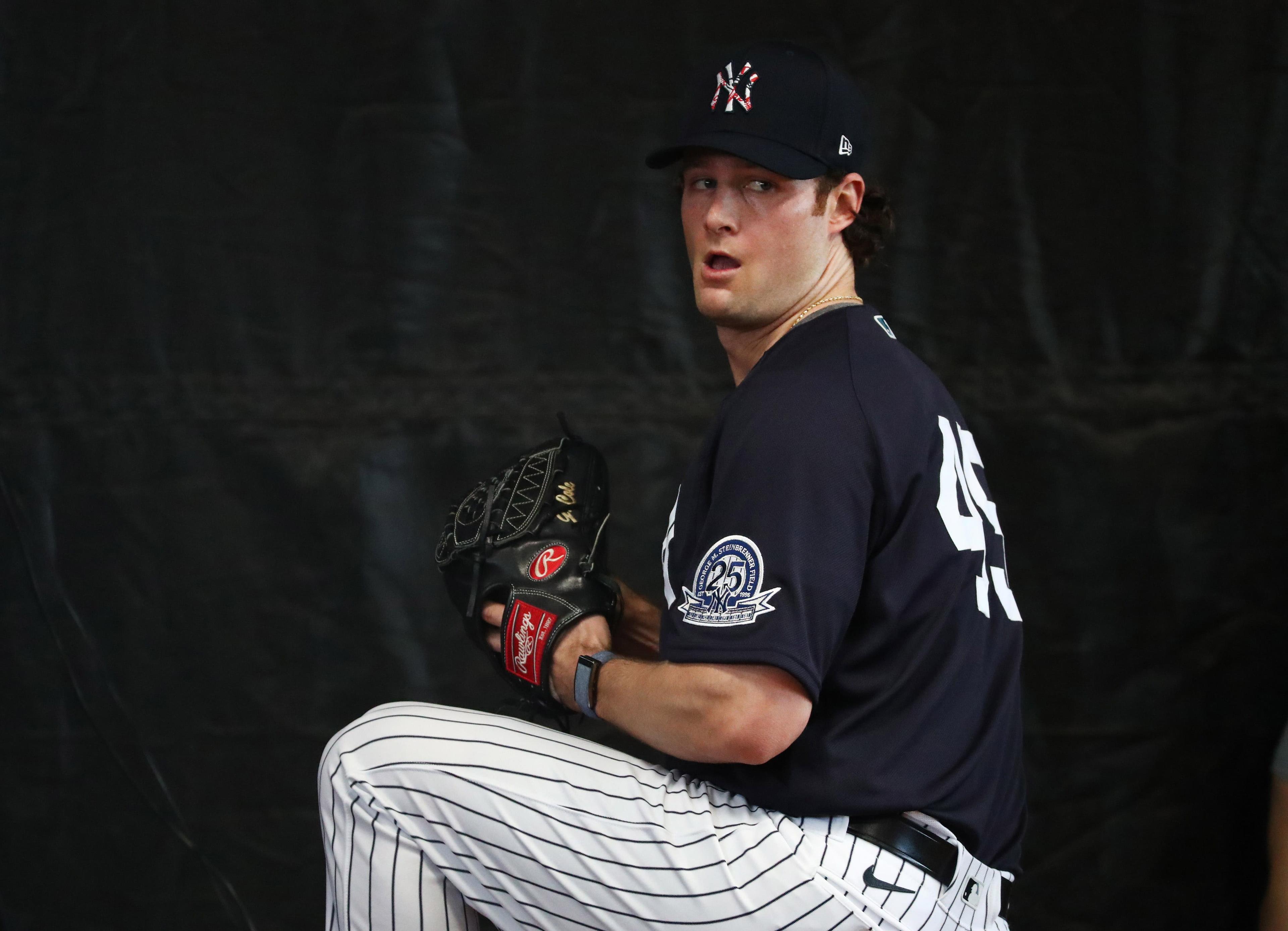 Feb 12, 2020; Tampa, Florida, USA; New York Yankees starting pitcher Gerrit Cole (45) throws during a bullpen session as pitchers and catchers report for spring training at George M. Steinbrenner Field. Mandatory Credit: Kim Klement-USA TODAY Sports / Kim Klement