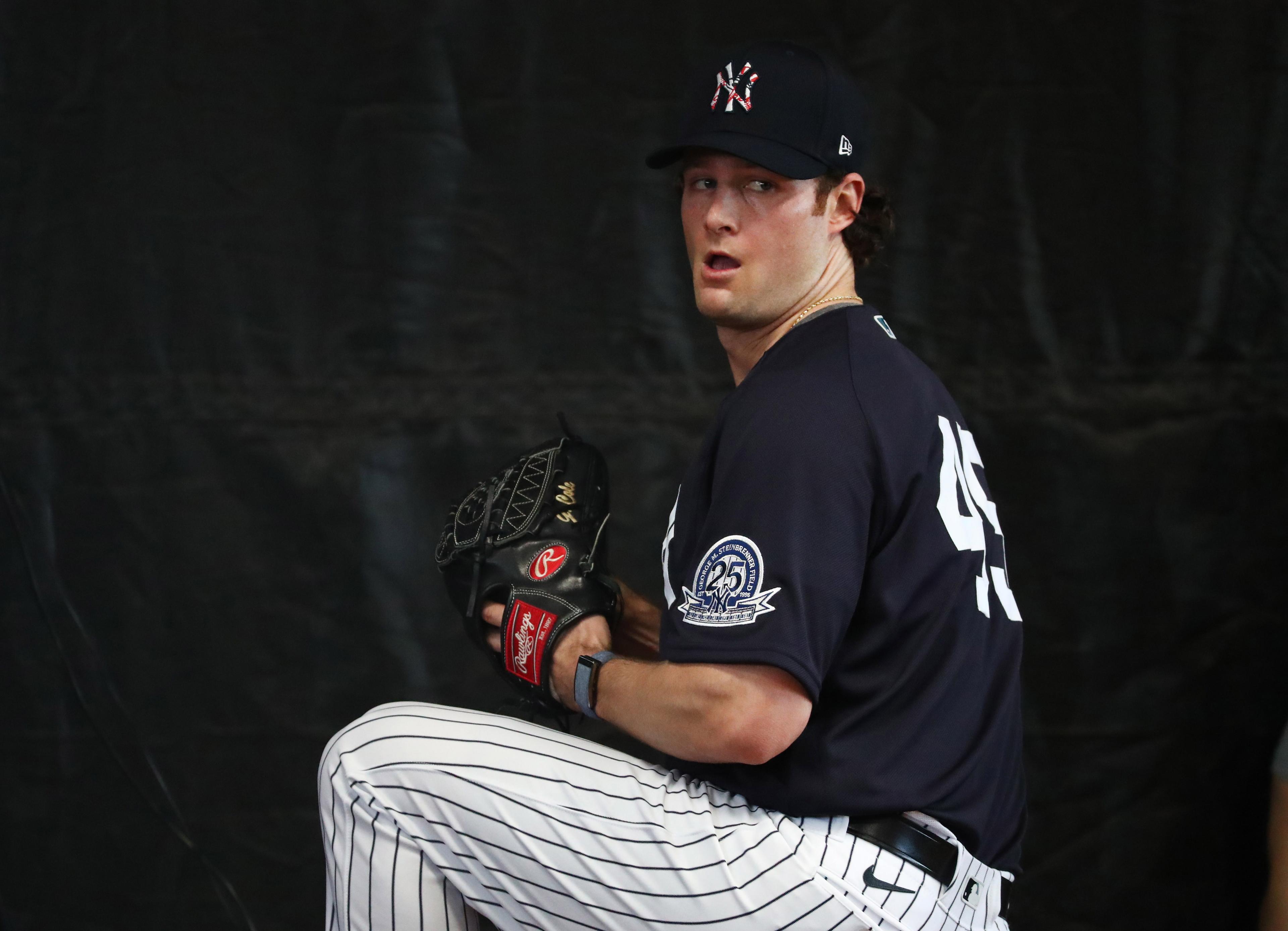 Feb 12, 2020; Tampa, Florida, USA; New York Yankees starting pitcher Gerrit Cole (45) throws during a bullpen session as pitchers and catchers report for spring training at George M. Steinbrenner Field. Mandatory Credit: Kim Klement-USA TODAY Sports