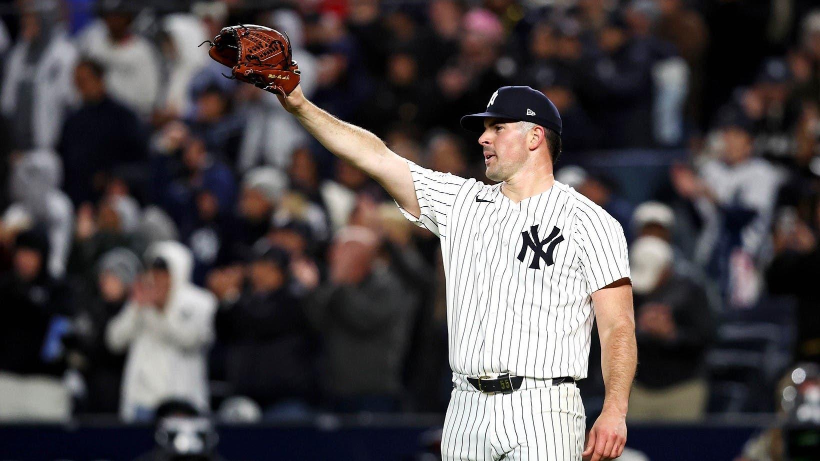 Oct 14, 2024; Bronx, New York, USA; New York Yankees pitcher Carlos Rodón (55) celebrates after a fly ball was caught to end the sixth inning against the Cleveland Guardians in game one of the ALCS for the 2024 MLB Playoffs at Yankee Stadium. 