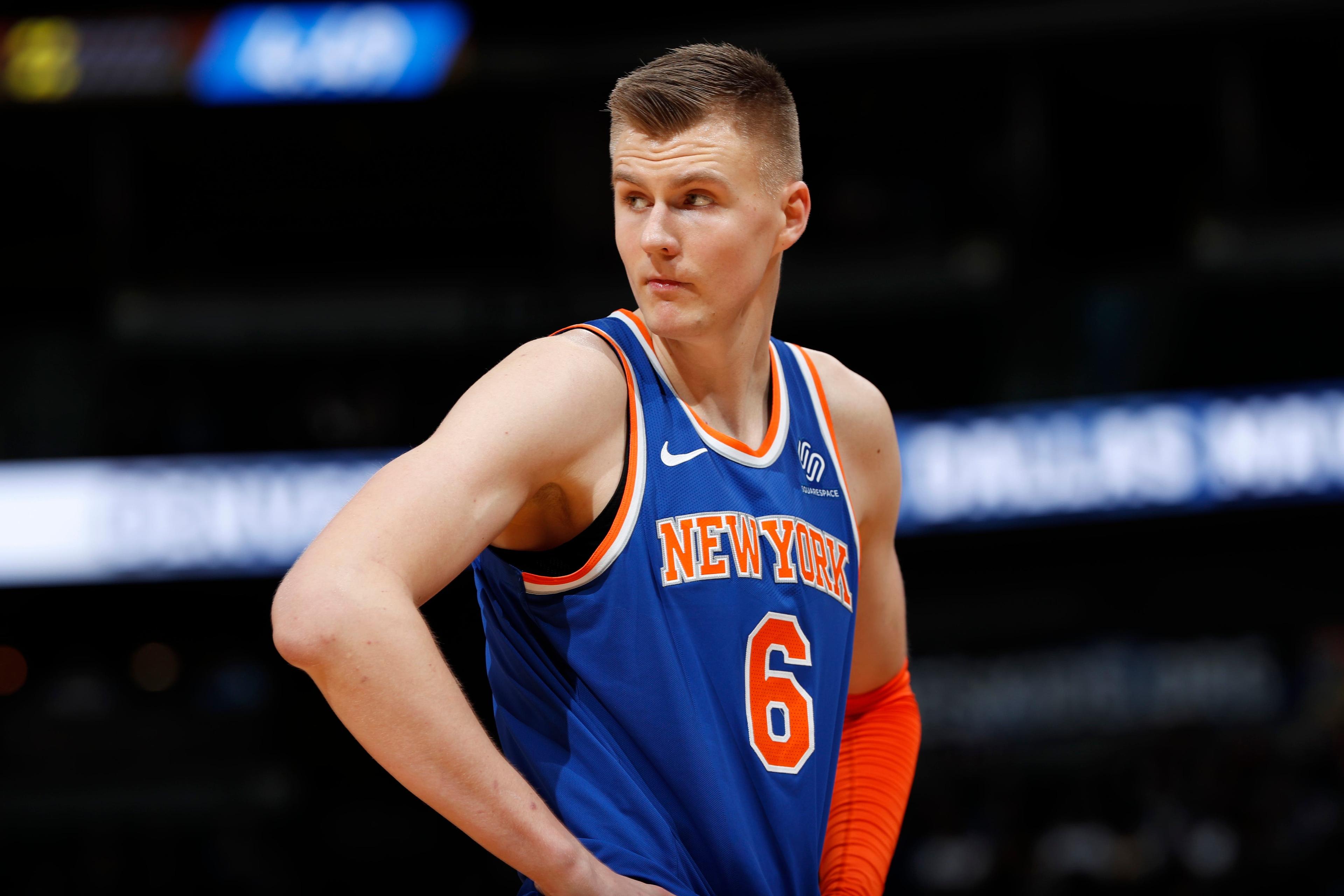 New York Knicks forward Kristaps Porzingis, of Latvia, reacts after fouling out against the Denver Nuggets in the second half of an NBA basketball game Thursday, Jan. 25, 2018, in Denver. The Nuggets won 130-118. (AP Photo/David Zalubowski) / David Zalubowski/AP