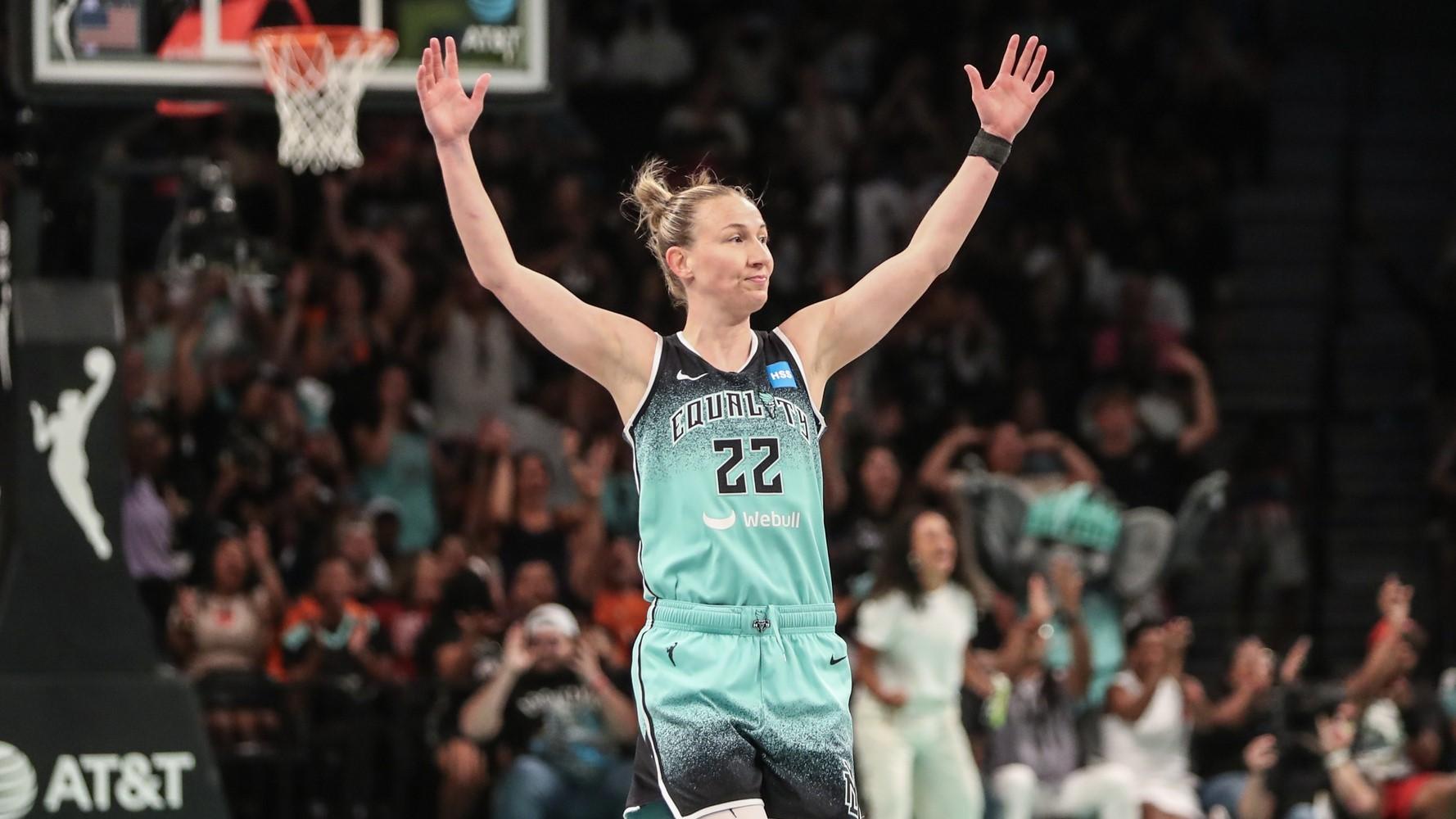 Aug 6, 2023; Brooklyn, New York, USA; New York Liberty guard Courtney Vandersloot (22) celebrates after scoring in the second quarter against the Las Vegas Aces at Barclays Center. / Wendell Cruz-USA TODAY Sports