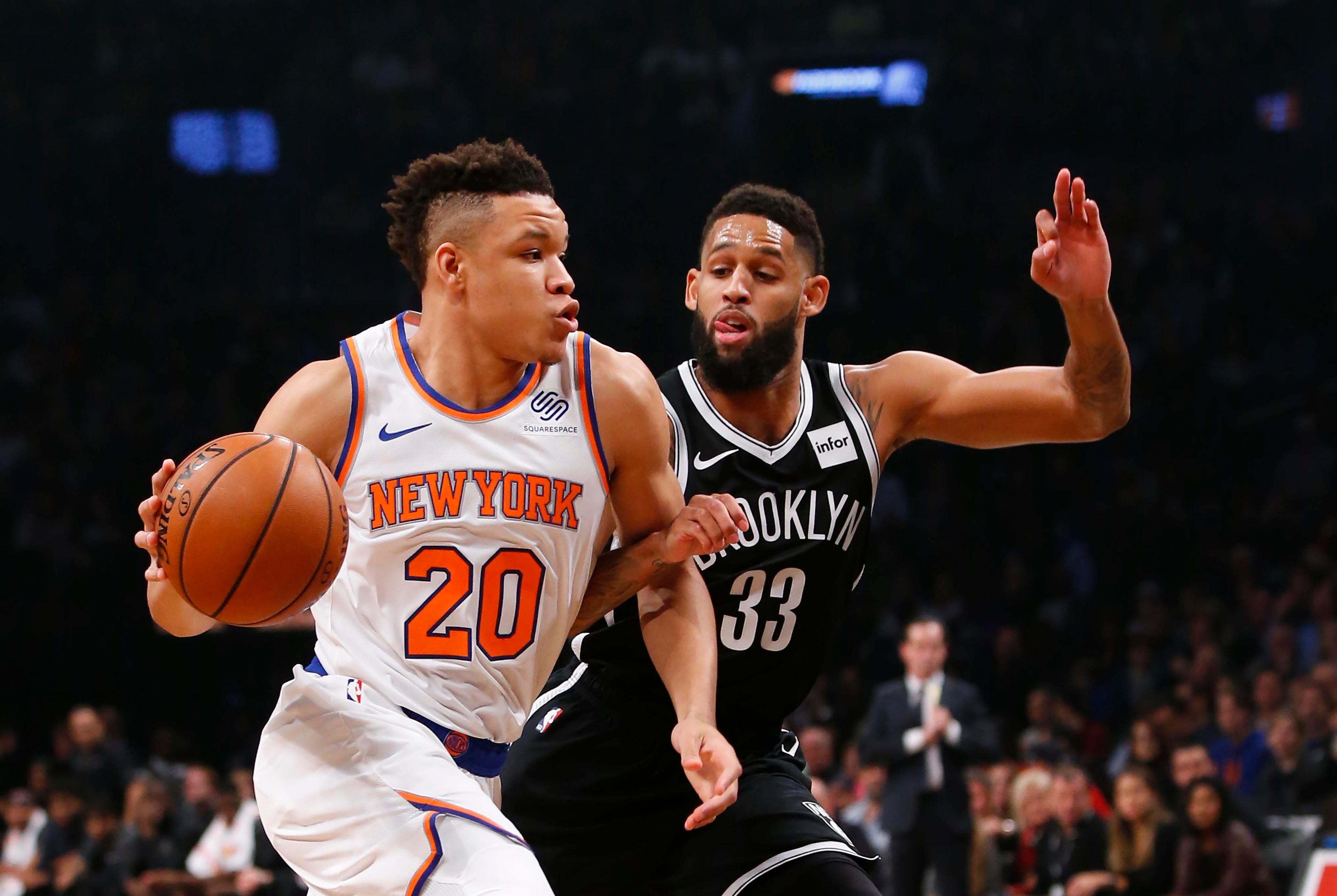 Oct 19, 2018; Brooklyn, NY, USA; New York Knicks forward Kevin Knox (20) drives to the basket against Brooklyn Nets guard Allen Crabbe (33) during the first half at Barclays Center. Mandatory Credit: Noah K. Murray-USA TODAY Sports / Noah K. Murray