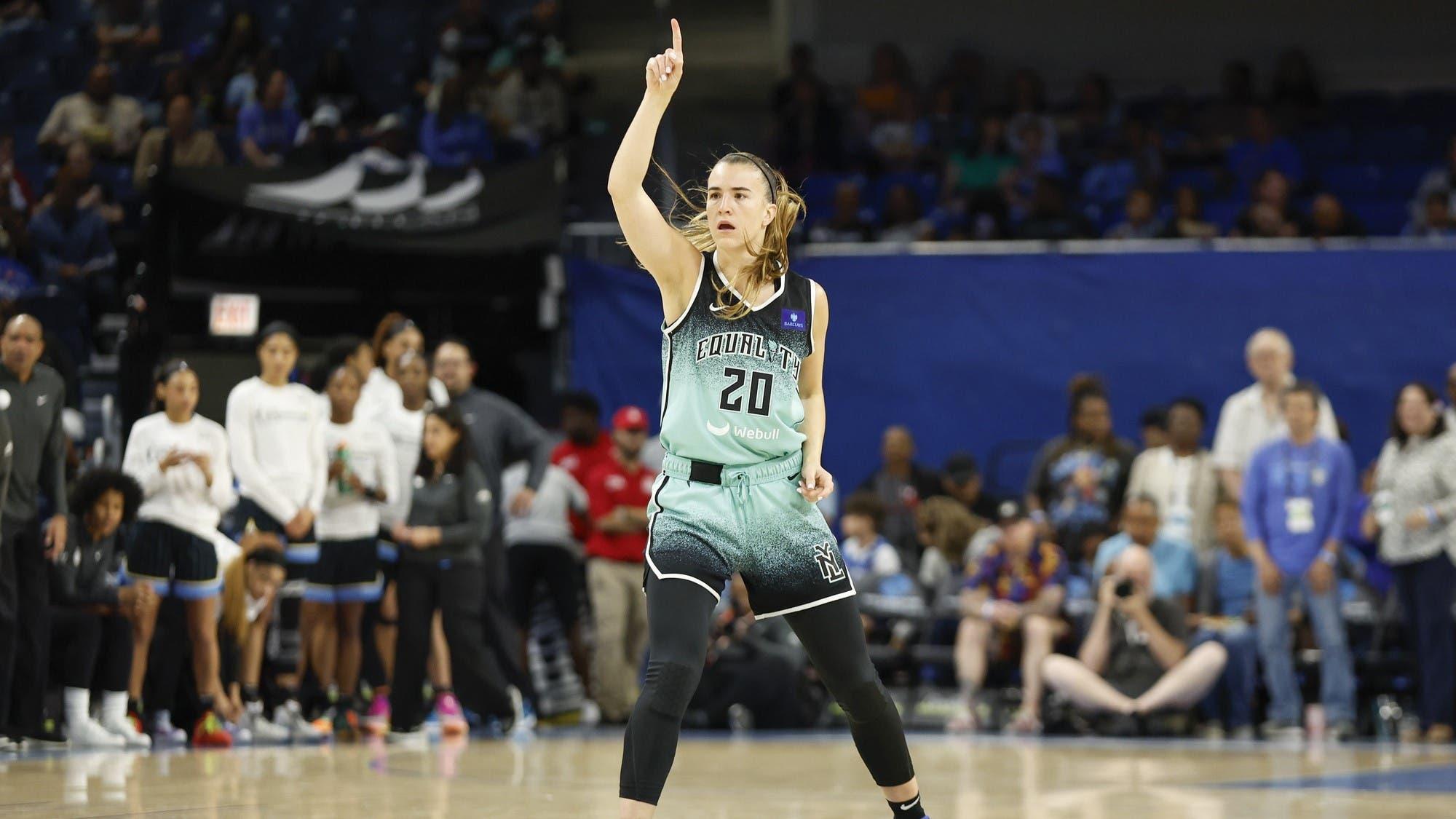 Jun 4, 2024; Chicago, Illinois, USA; New York Liberty guard Sabrina Ionescu (20) reacts after scoring against the Chicago Sky during the first half of a WNBA game at Wintrust Arena. / Kamil Krzaczynski-USA TODAY Sports