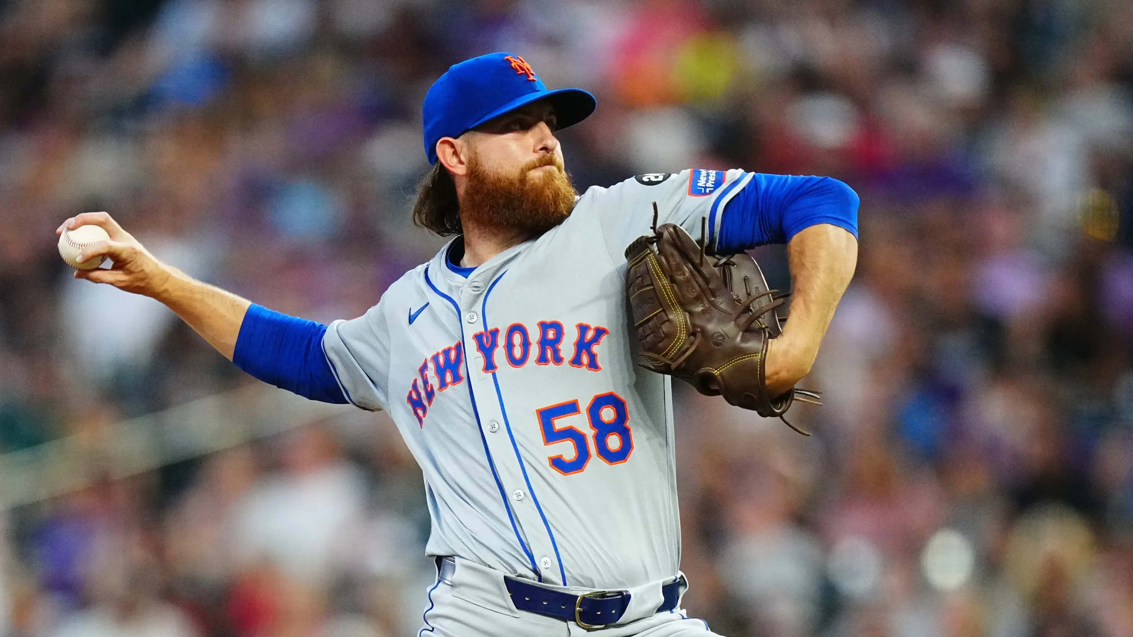 Aug 7, 2024; Denver, Colorado, USA; New York Mets starting pitcher Paul Blackburn (58) delivers a pitch in the sixth inning against the Colorado Rockies at Coors Field. Mandatory Credit: Ron Chenoy-USA TODAY Sports / © Ron Chenoy-USA TODAY Sports