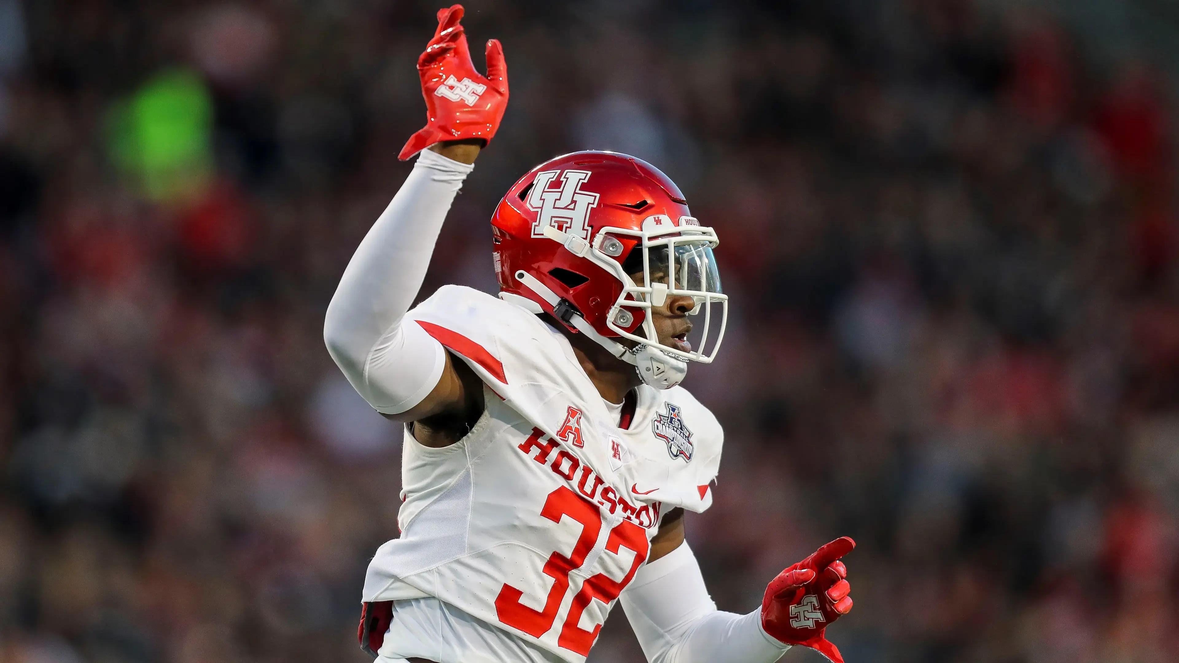 Dec 4, 2021; Cincinnati, Ohio, USA; Houston Cougars safety Gervarrius Owens (32) reacts after the field goal by the Cincinnati Bearcats is no good in the first half during the American Athletic Conference championship game at Nippert Stadium. Mandatory Credit: Katie Stratman-USA TODAY Sports / © Katie Stratman-USA TODAY Sports