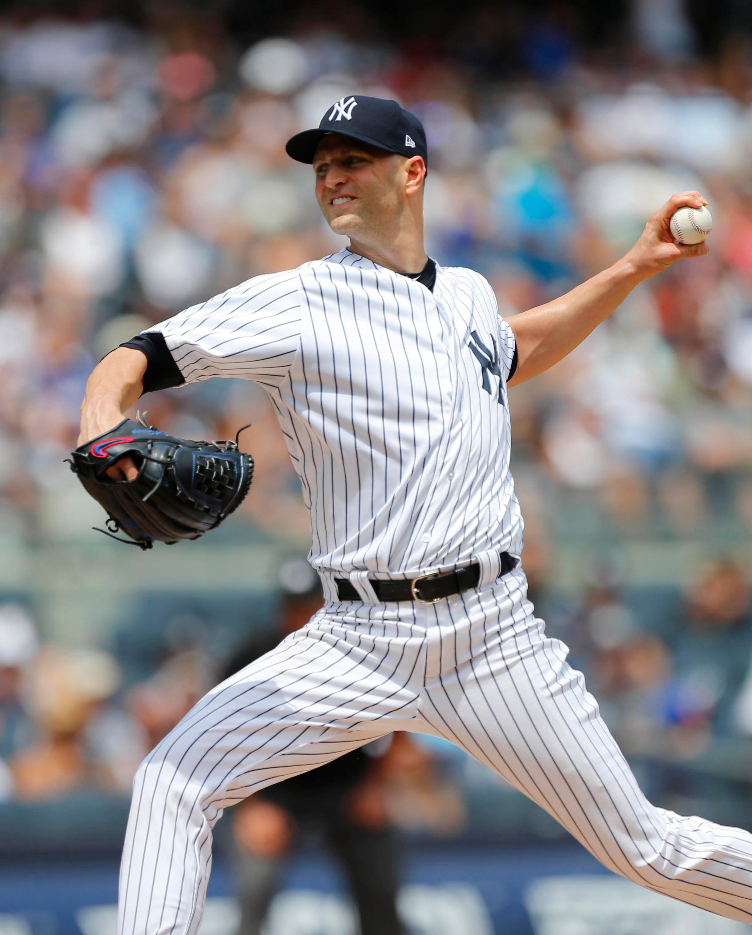 New York Yankees starting pitcher J.A. Happ pitches against the Kansas City Royals in the second inning at Yankee Stadium.